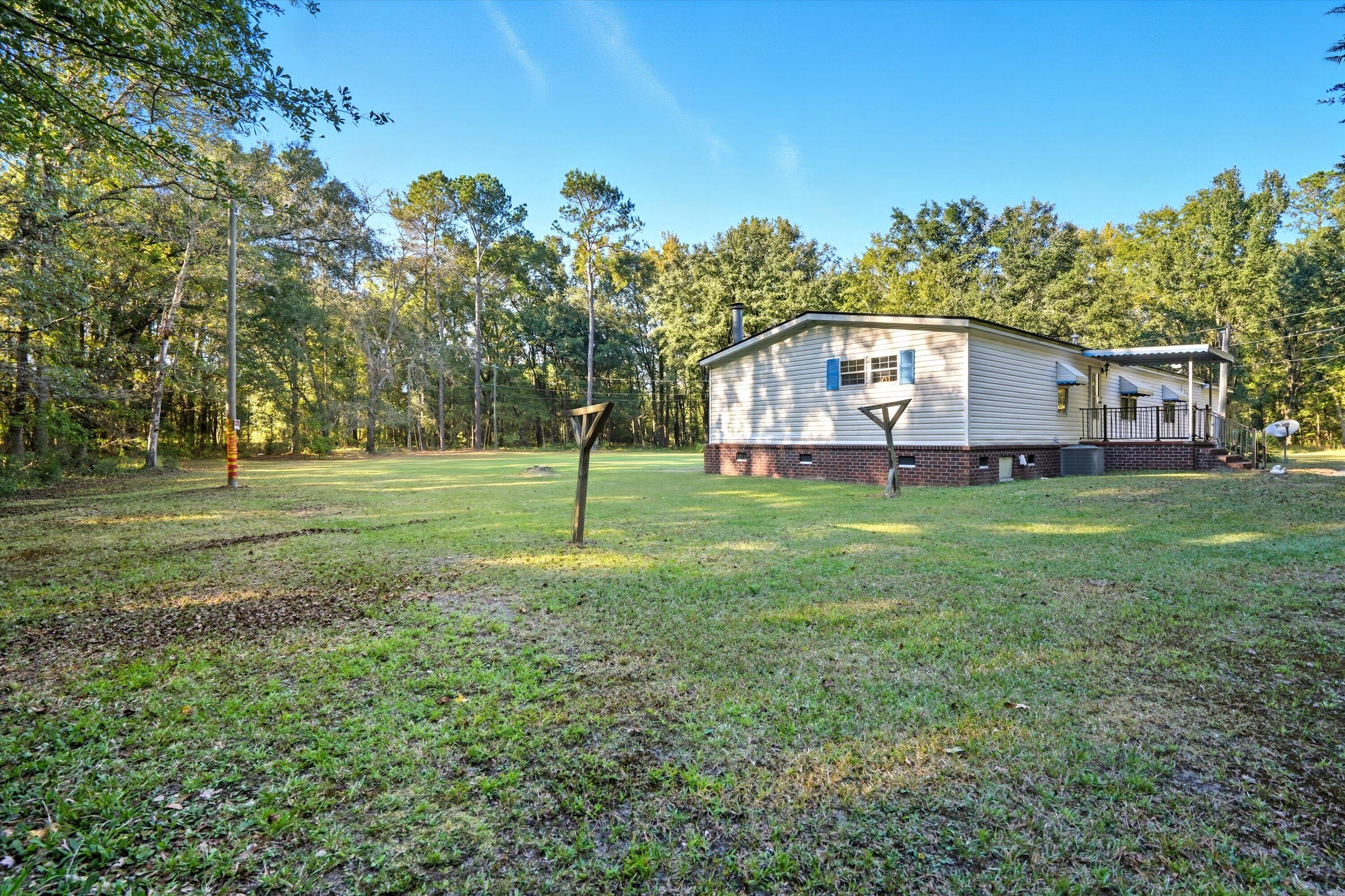 120 Princess Lane Cross, SC 29436 - Photo 35 of 37 35-032_SNY09019_with_clouds