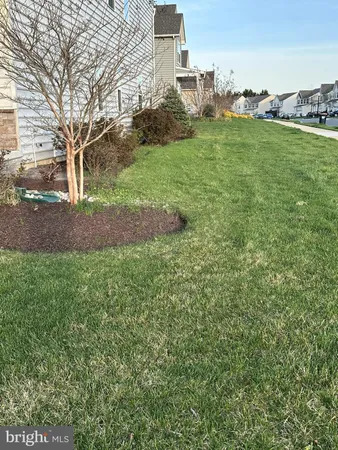 a view of a backyard with garden