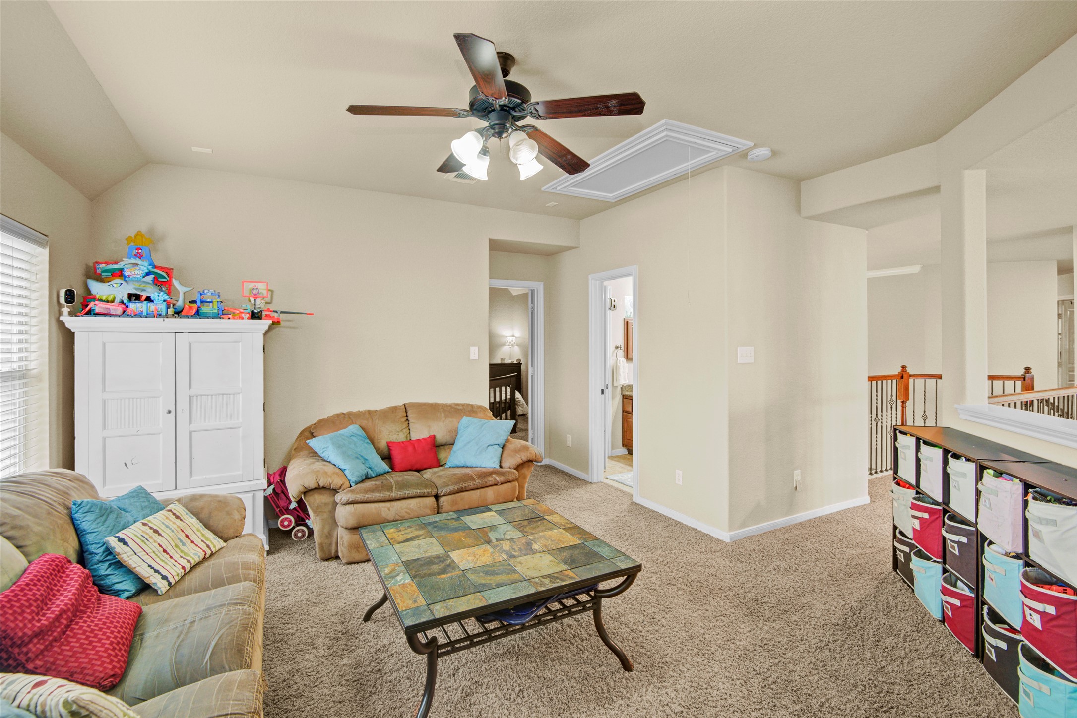6007 Valhalla Drive Spring, TX 77379 - Photo 26 of 37 Large windows and an open layout make the upstairs game room an inviting gathering space for family and guests.