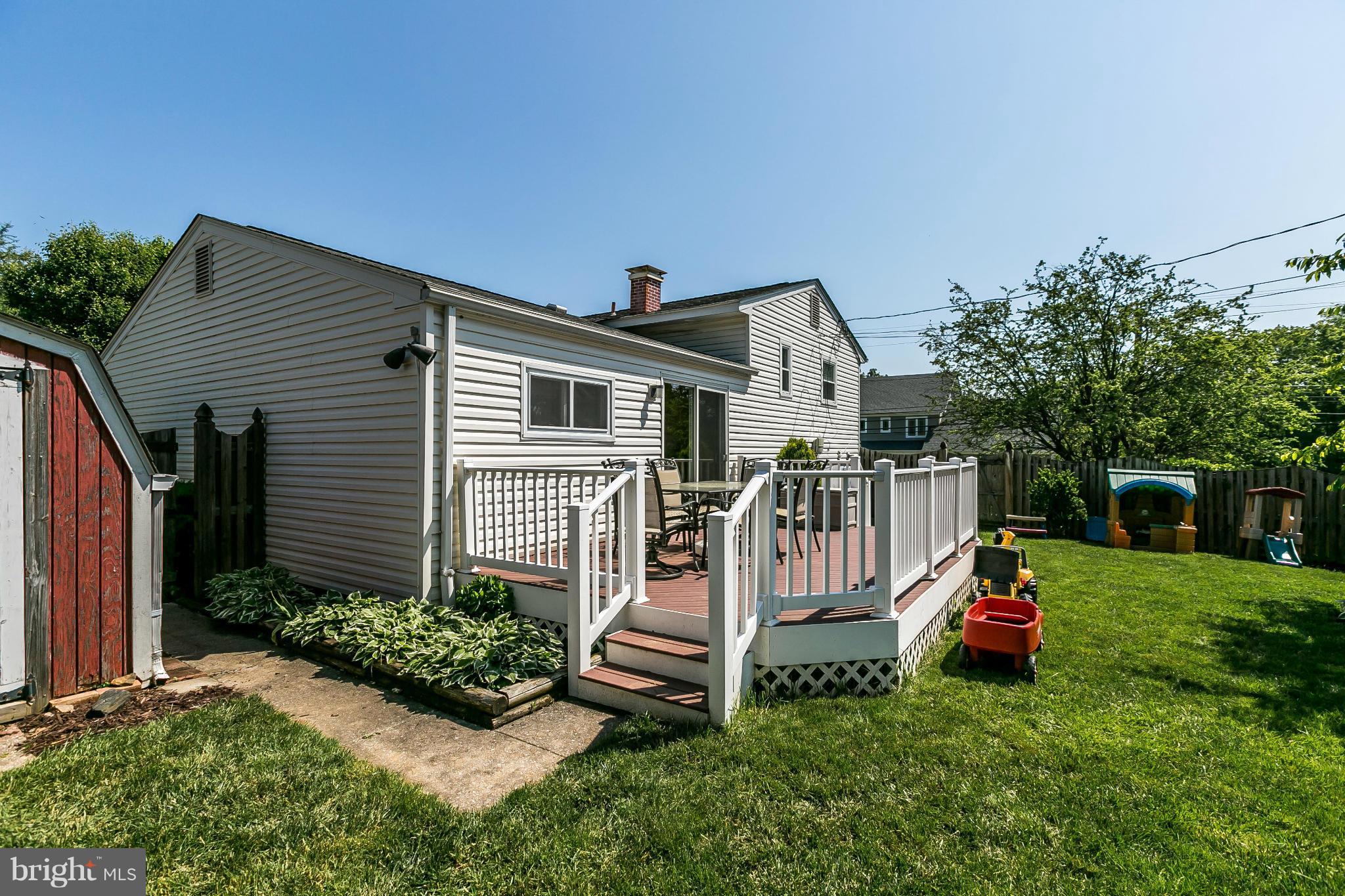 1901 Logwind Road Catonsville, MD 21228 - Photo 21 of 30 a view of a house with a backyard and deck