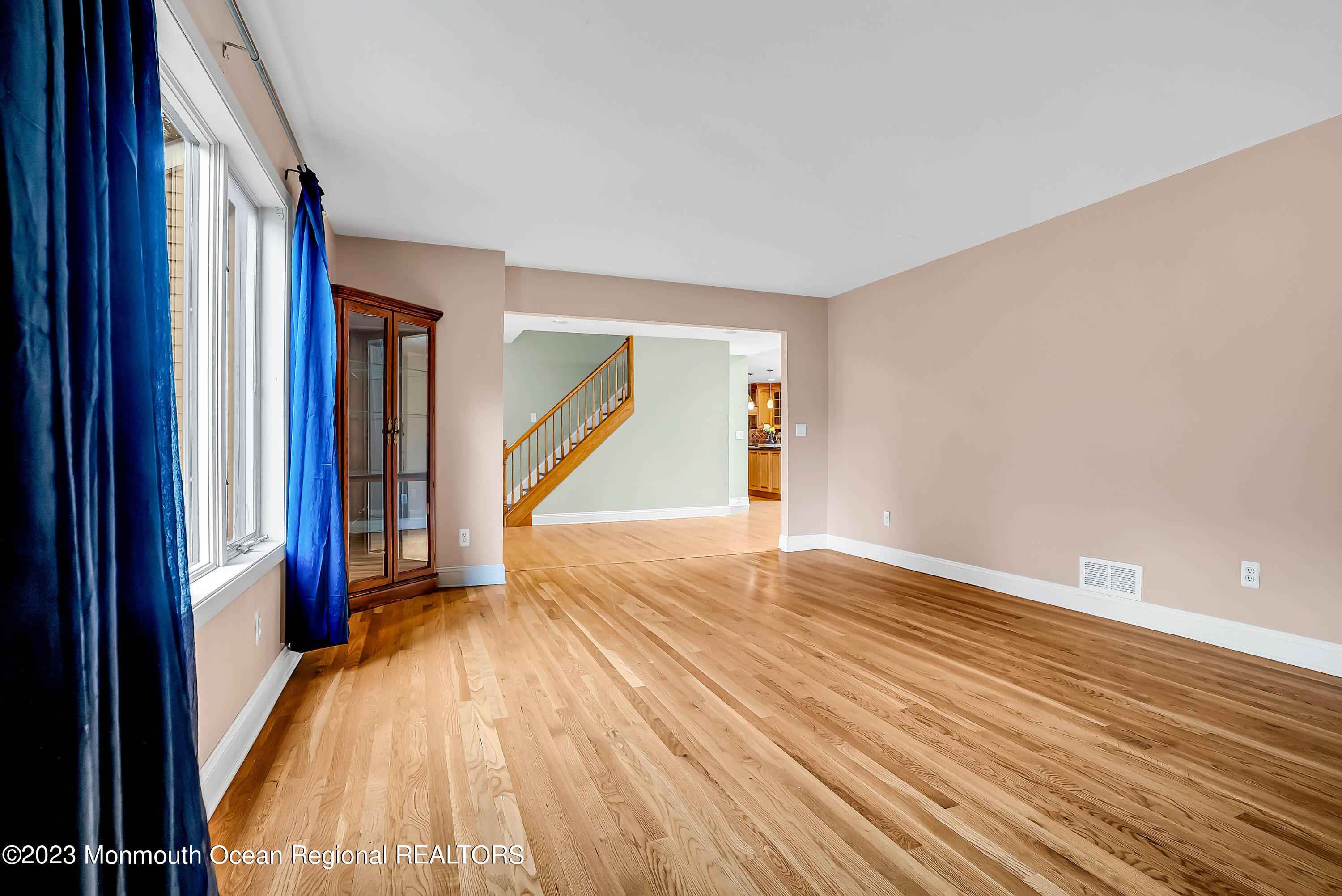 200 Parker Road West Long Branch, NJ 07764 - Photo 11 of 50 a view of an empty room with wooden floor and a window