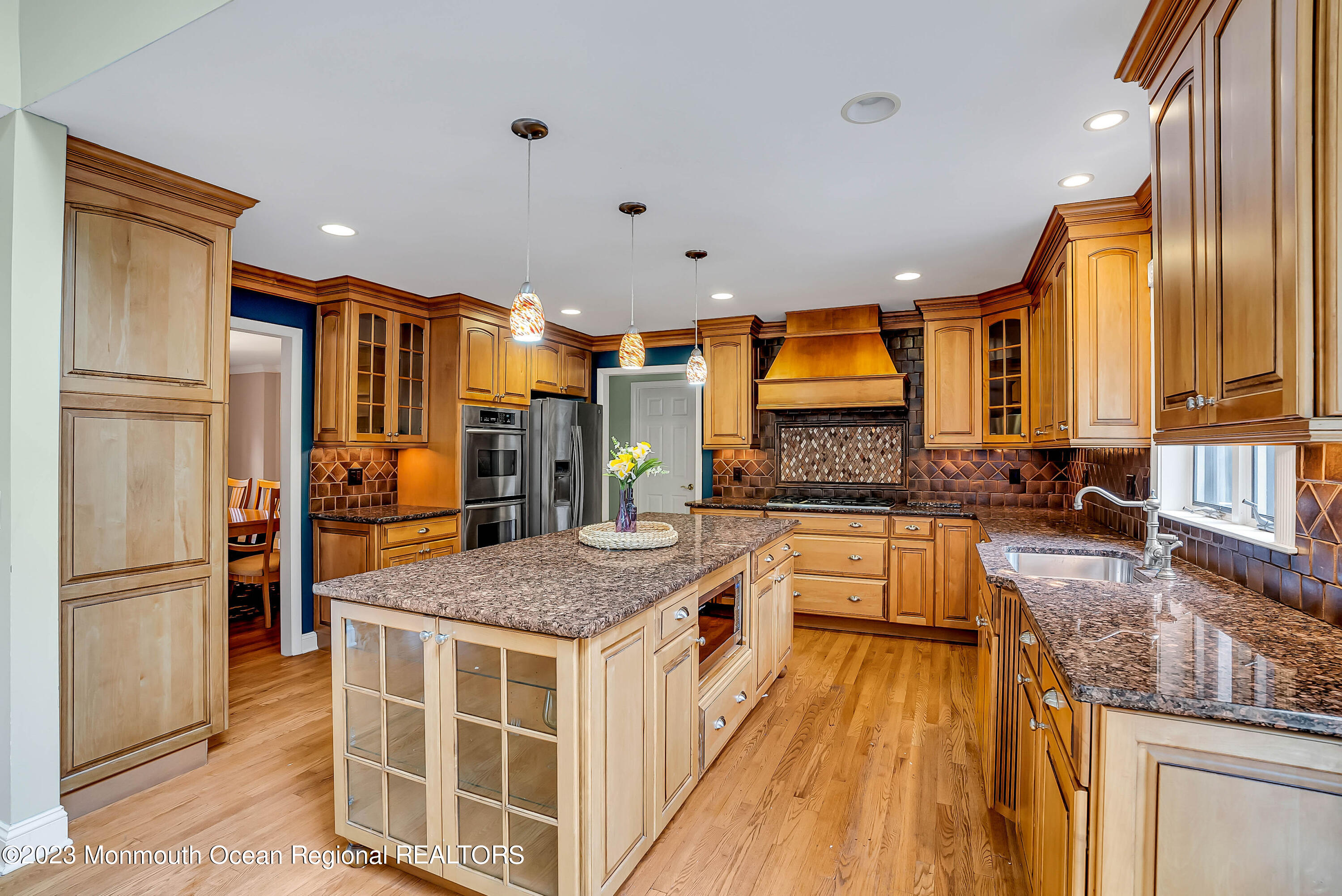 200 Parker Road West Long Branch, NJ 07764 - Photo 14 of 50 a kitchen with stainless steel appliances granite countertop a stove a sink and a refrigerator