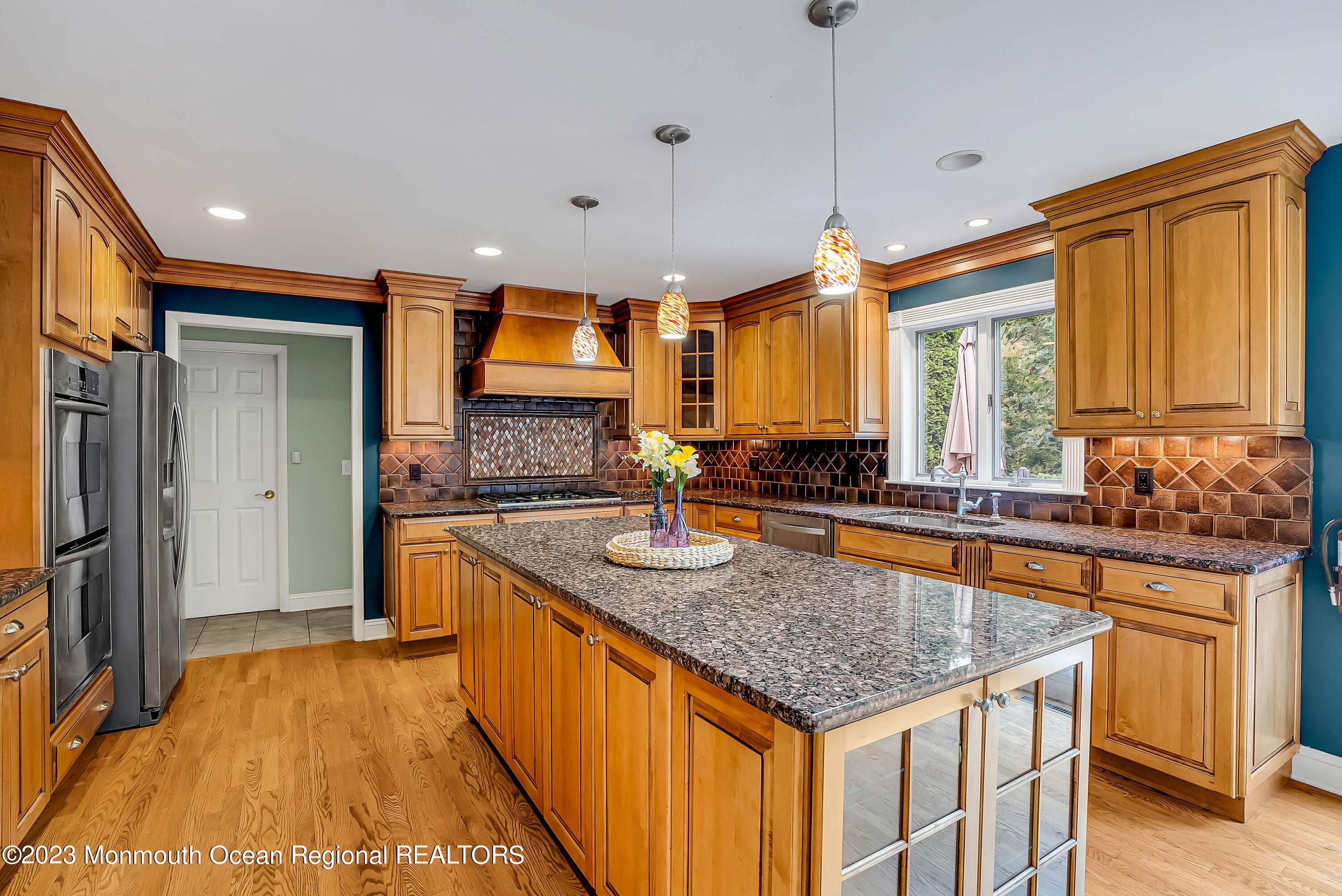 200 Parker Road West Long Branch, NJ 07764 - Photo 15 of 50 a kitchen with stainless steel appliances granite countertop a sink and a refrigerator