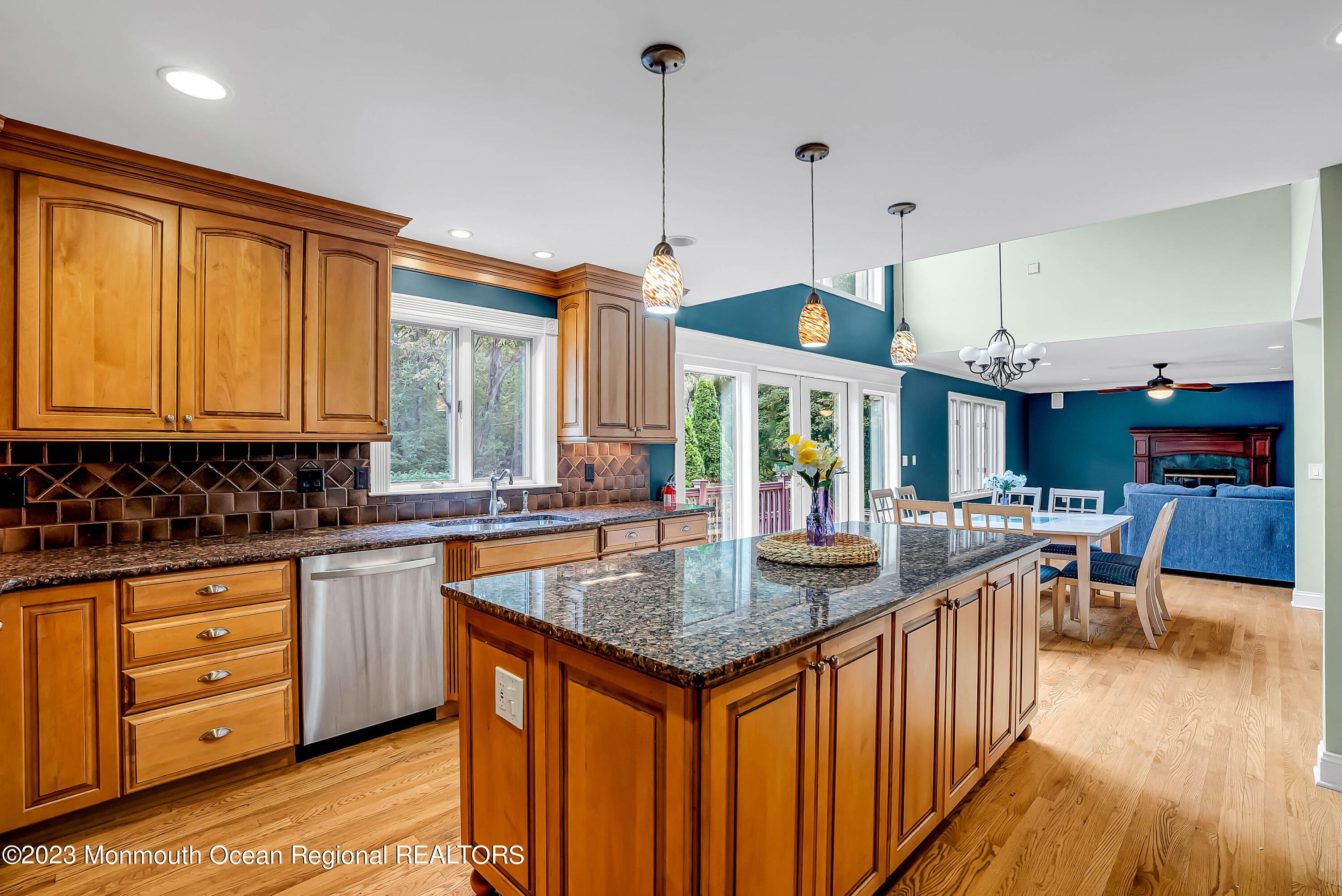 200 Parker Road West Long Branch, NJ 07764 - Photo 17 of 50 a kitchen with stainless steel appliances granite countertop a sink and a wooden floor