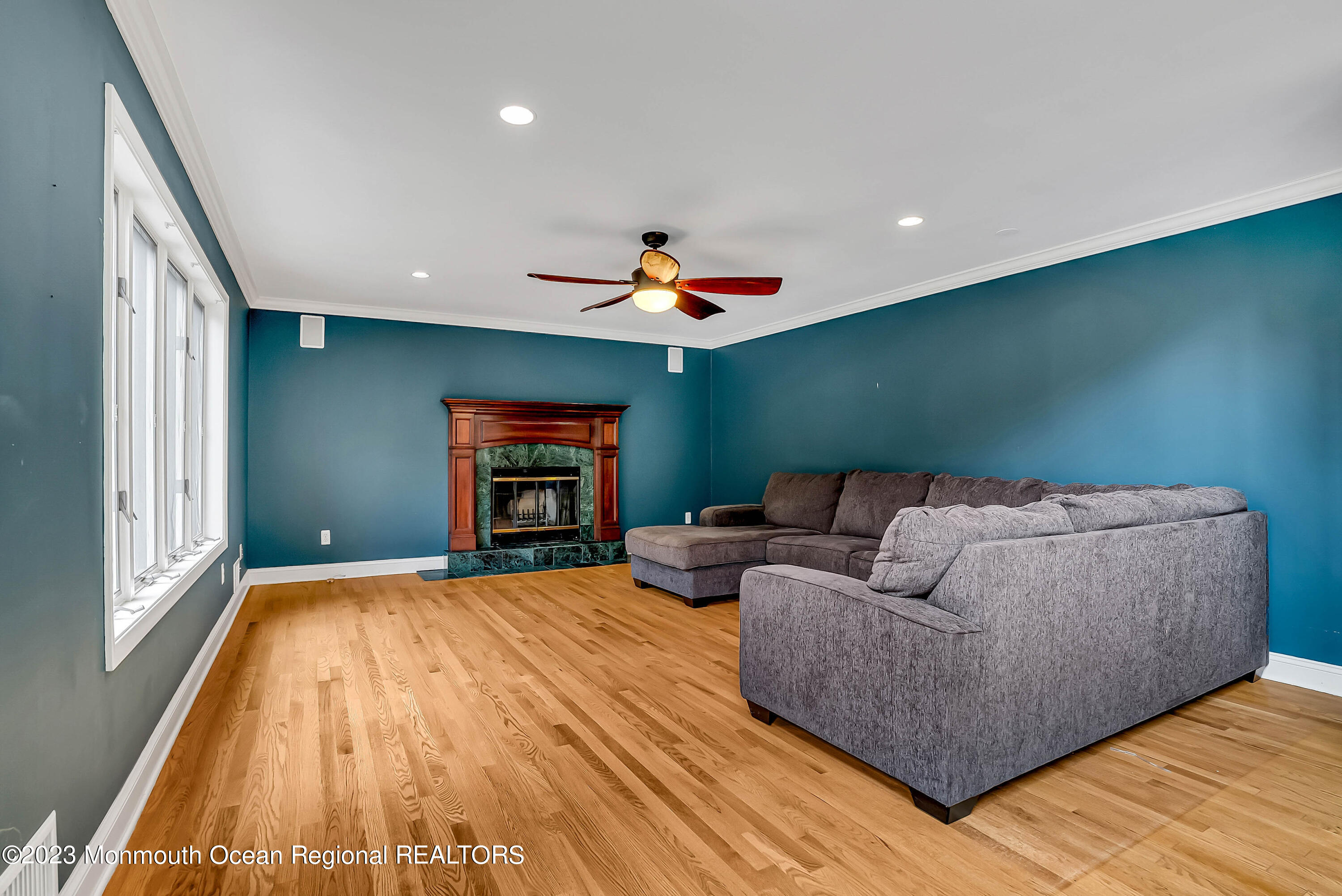 200 Parker Road West Long Branch, NJ 07764 - Photo 22 of 50 a living room with furniture and a fireplace