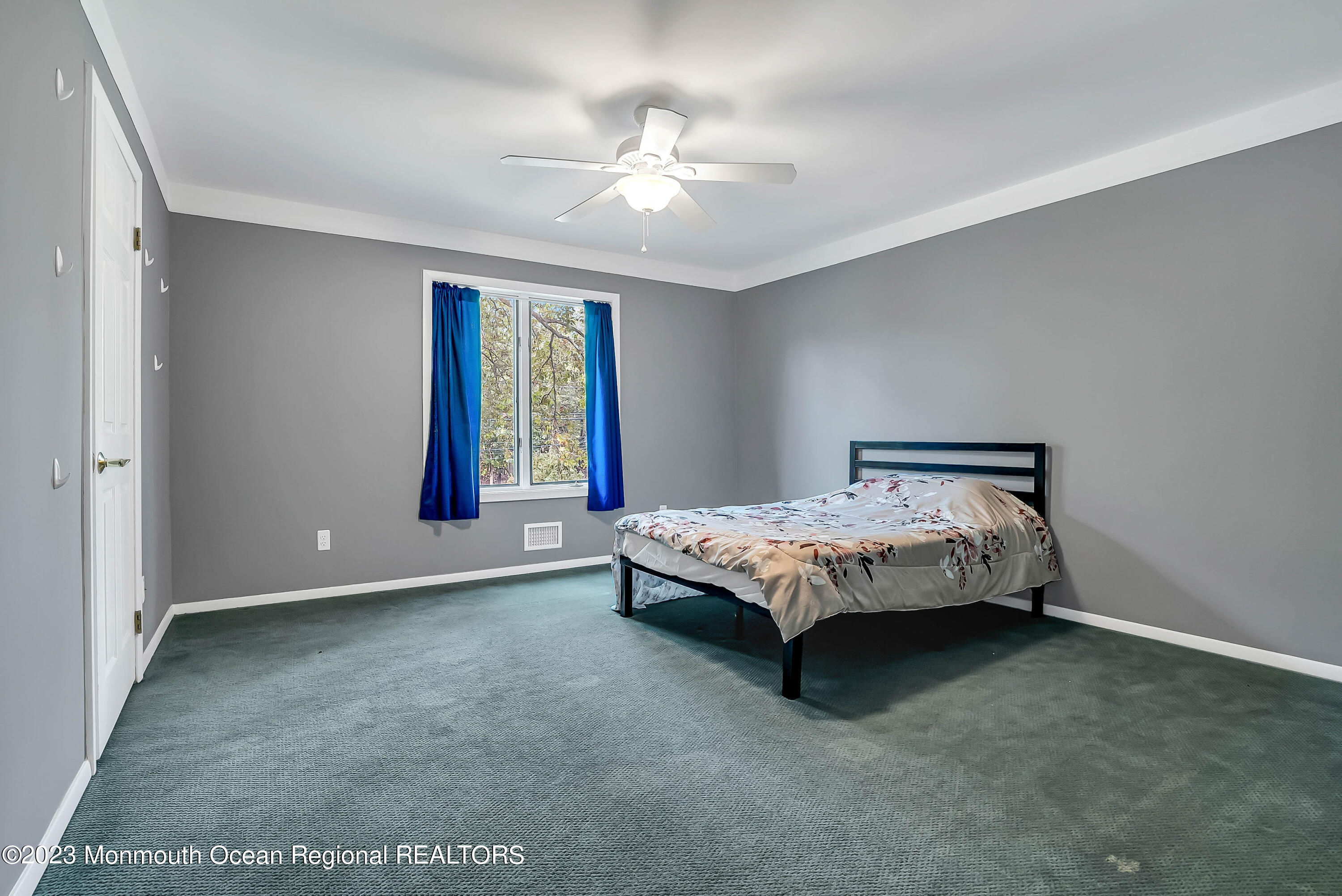 200 Parker Road West Long Branch, NJ 07764 - Photo 33 of 50 a bed sitting in a spacious bedroom next to a window