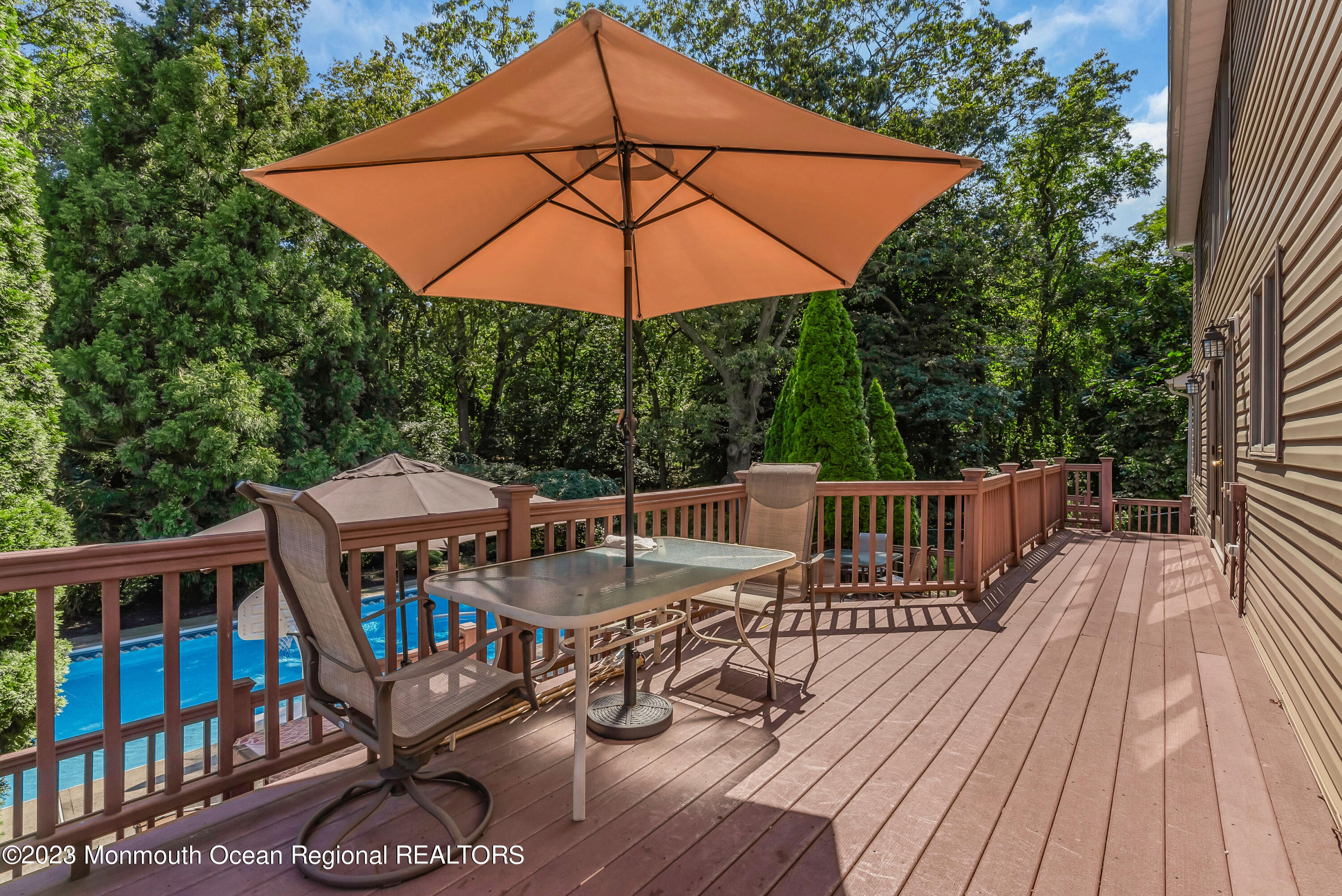 200 Parker Road West Long Branch, NJ 07764 - Photo 42 of 50 a view of balcony with outdoor seating and wooden floor