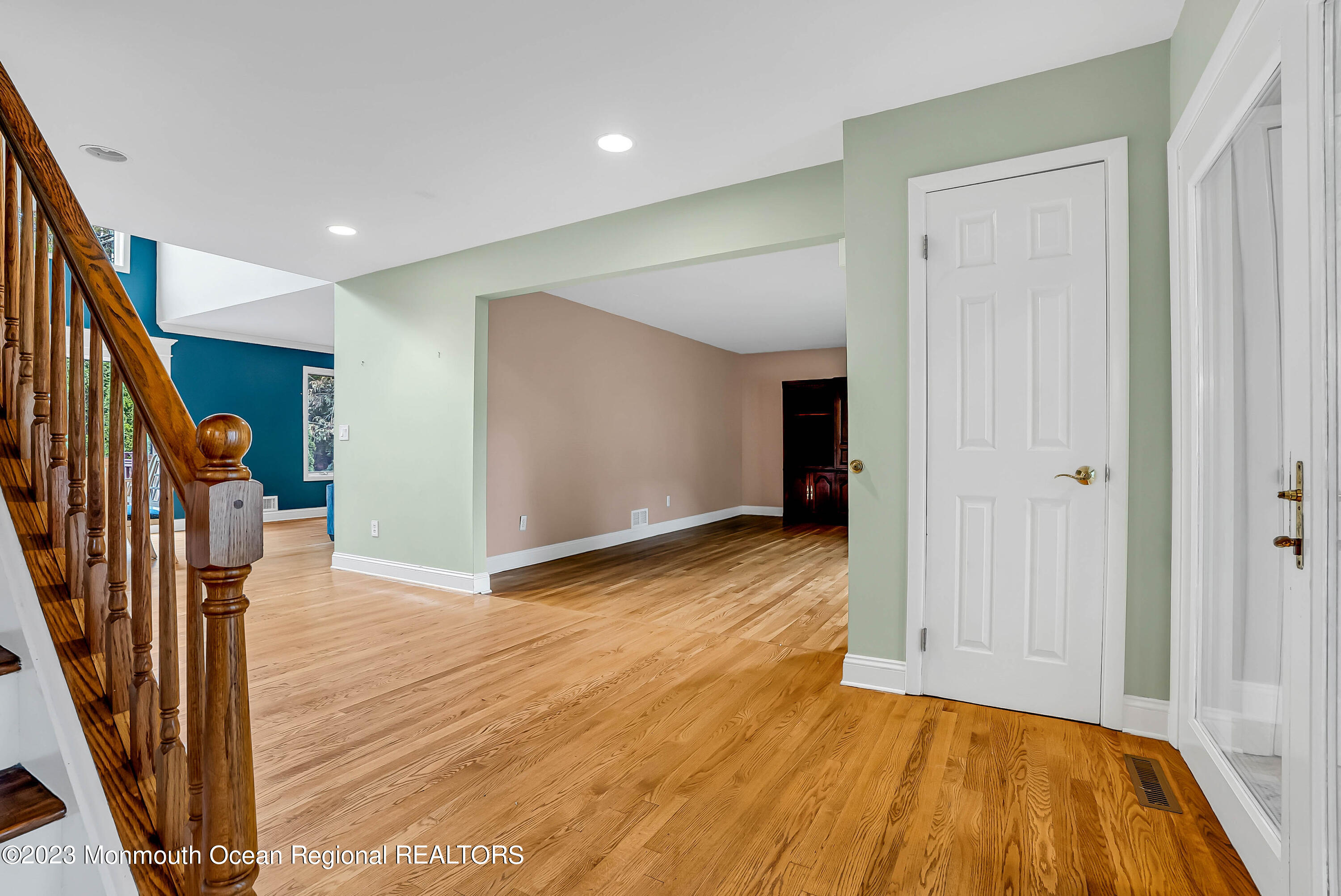 200 Parker Road West Long Branch, NJ 07764 - Photo 7 of 50 a view of empty room with wooden floor and stairs