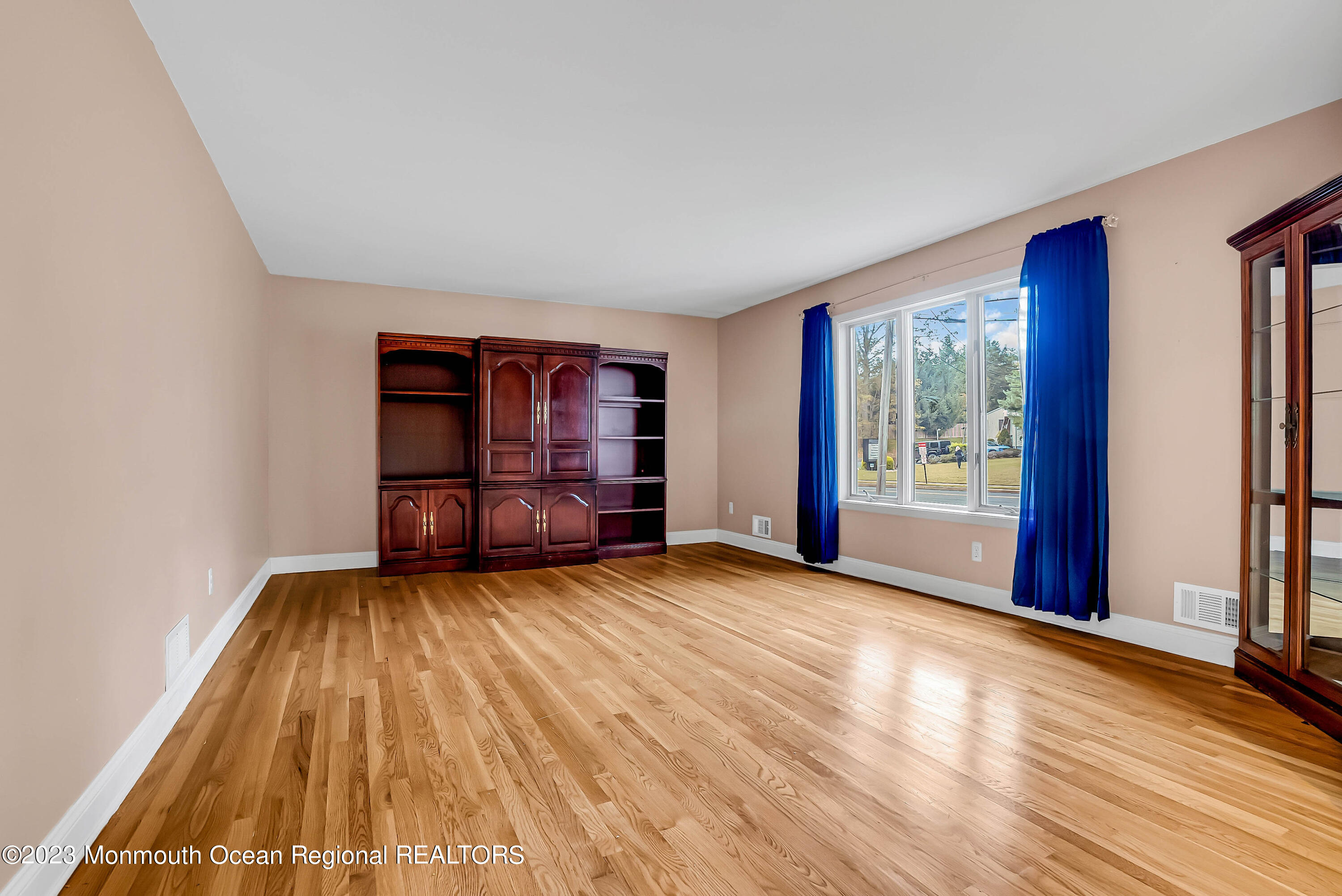 200 Parker Road West Long Branch, NJ 07764 - Photo 10 of 50 a view of empty room with wooden floor and fan