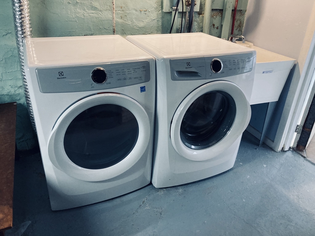 42 Alicia Road, Unit 1 Boston, MA 02124 - Photo 19 of 19 a utility room with dryer and washer