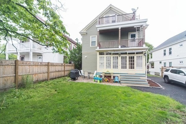 42 Alicia Road, Unit 1 Boston, MA 02124 - Photo 3 of 19 a front view of a house with a yard