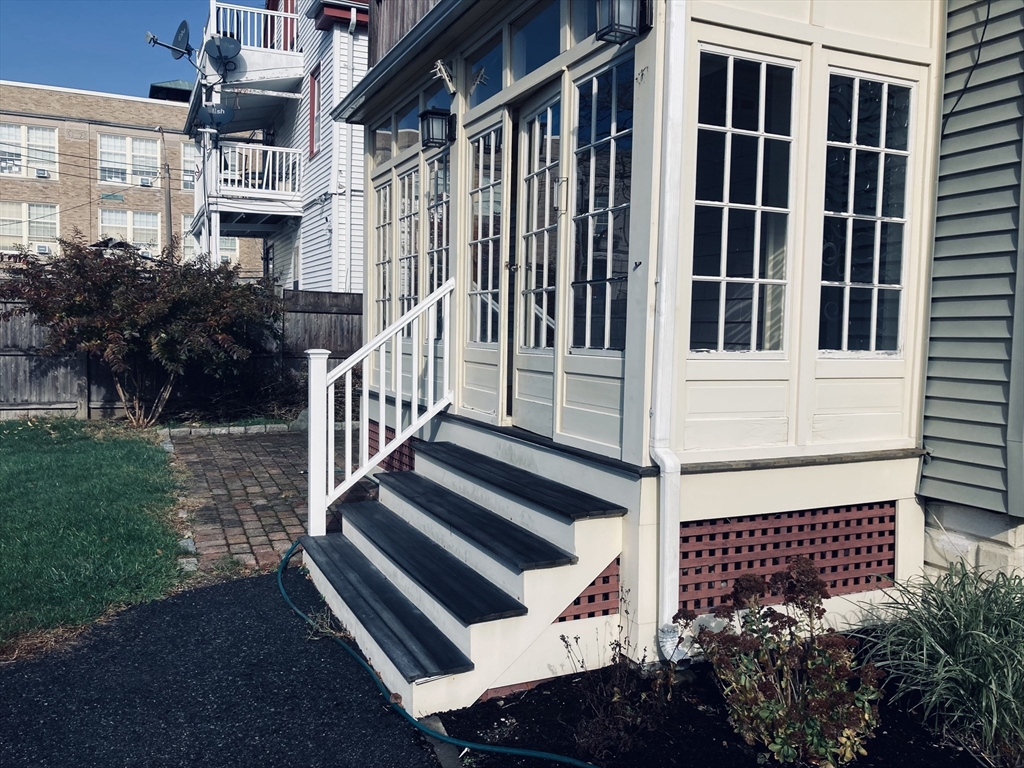 42 Alicia Road, Unit 1 Boston, MA 02124 - Photo 7 of 19 a view of a house with a yard
