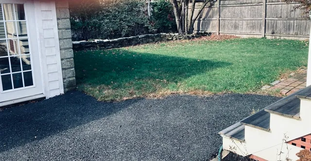 a backyard of a house with lots of green space