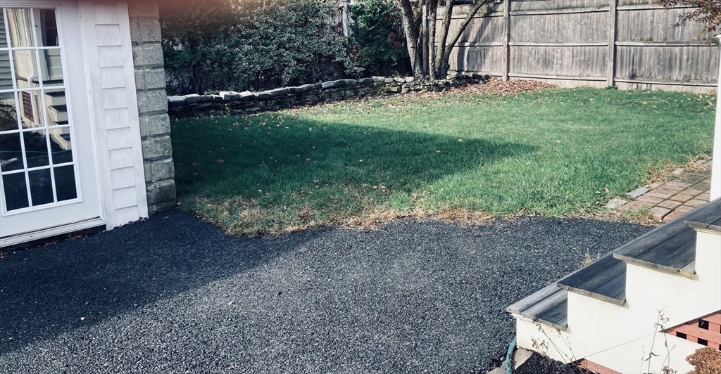 42 Alicia Road, Unit 1 Boston, MA 02124 - Photo 10 of 19 a backyard of a house with lots of green space