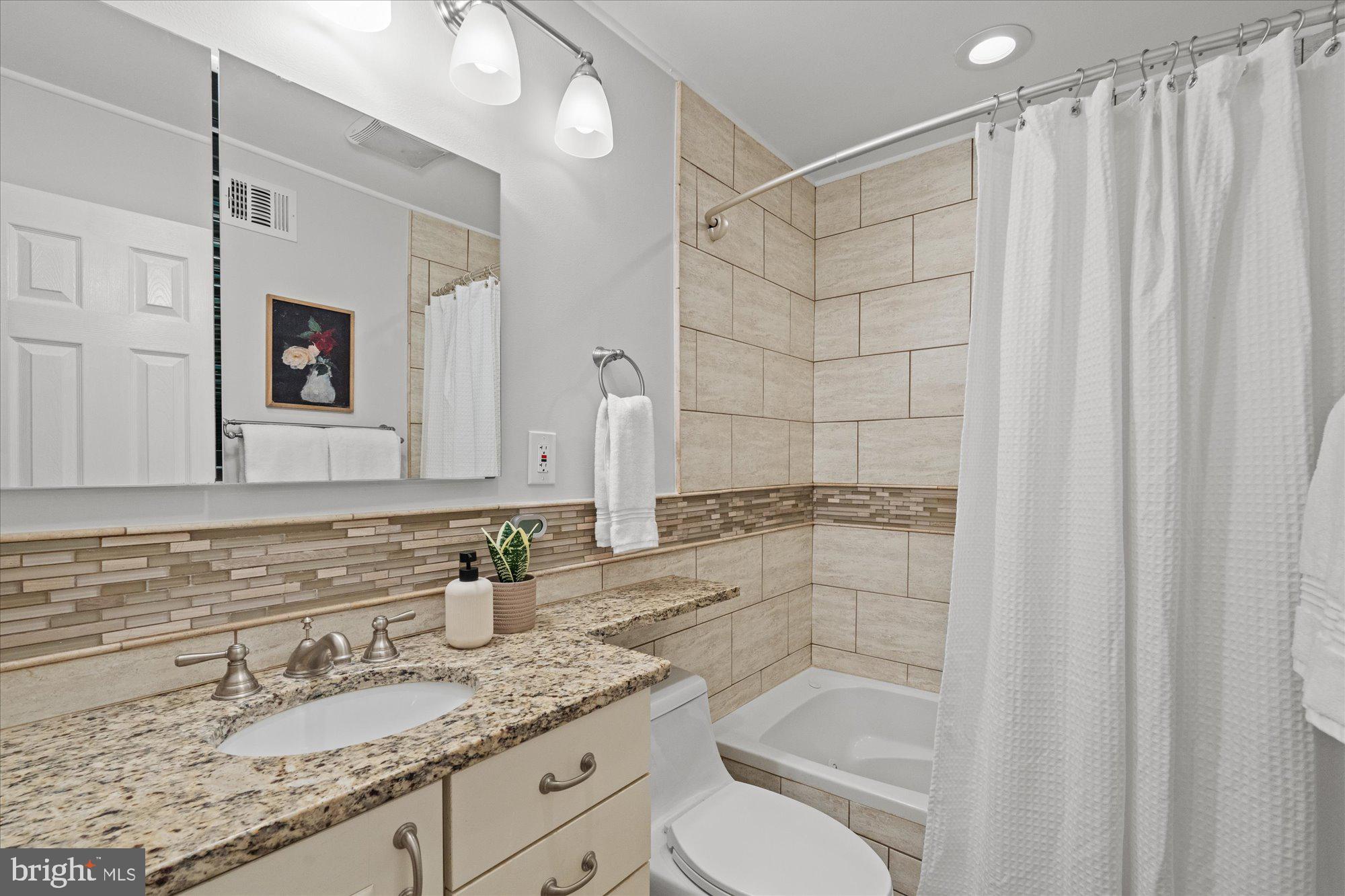 7020 Alicent Place McLean, VA 22101 - Photo 25 of 33 Upper hall bathroom