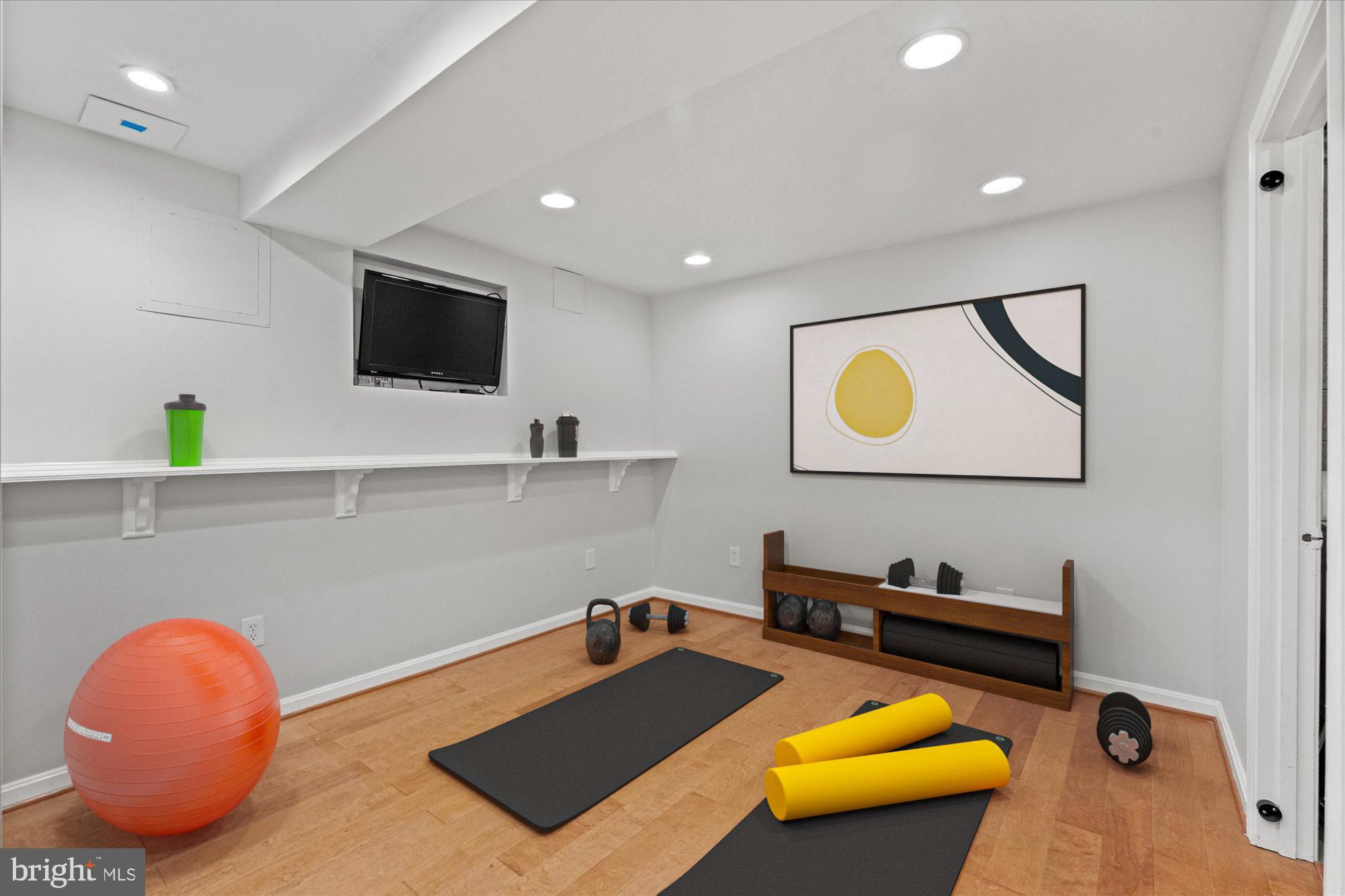 7020 Alicent Place McLean, VA 22101 - Photo 26 of 33 Basement fitness / rec area (virtually staged)