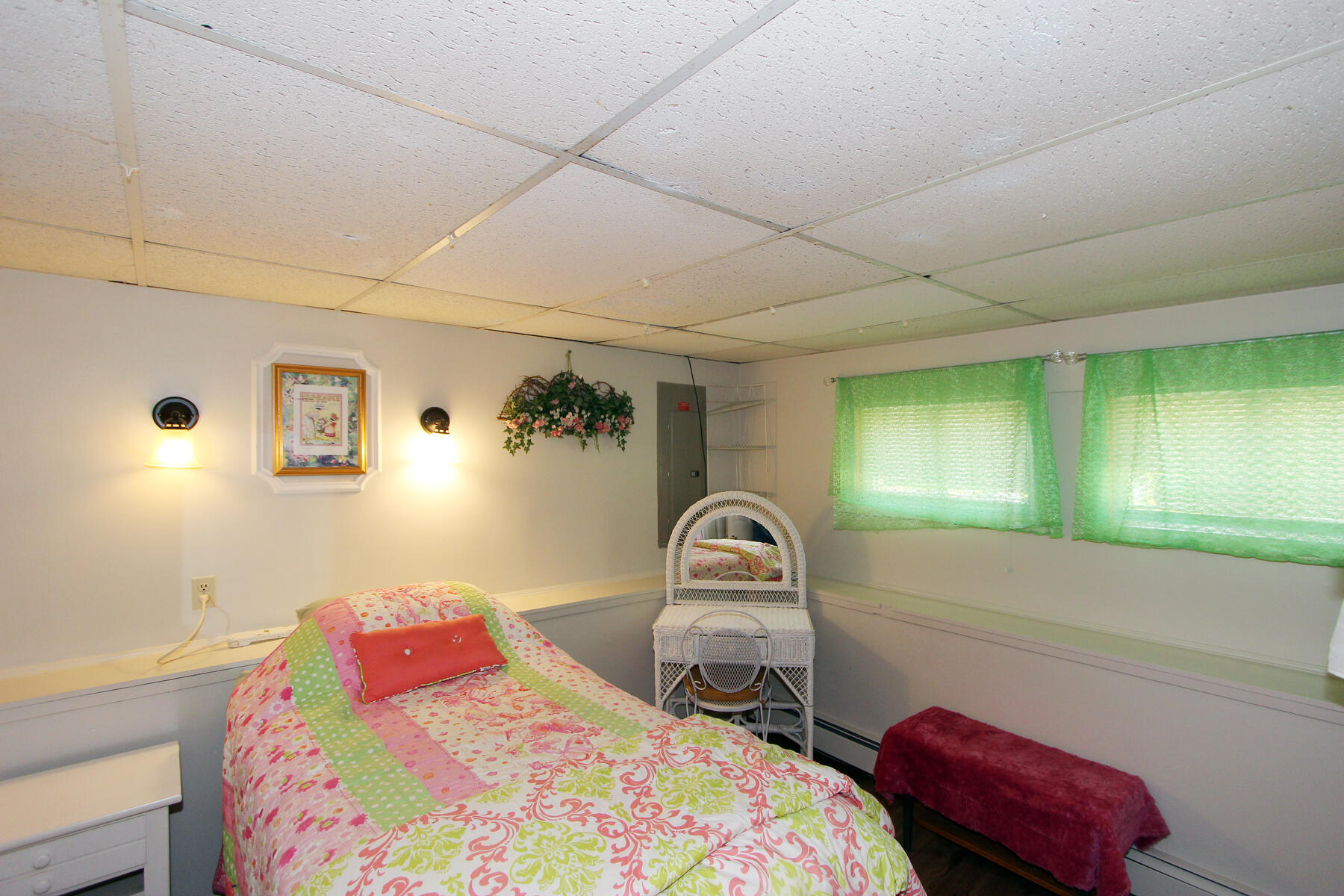 46 Foster Howard Road Pocasset, MA 02559 - Photo 44 of 70 a bedroom with a bed and a mirror