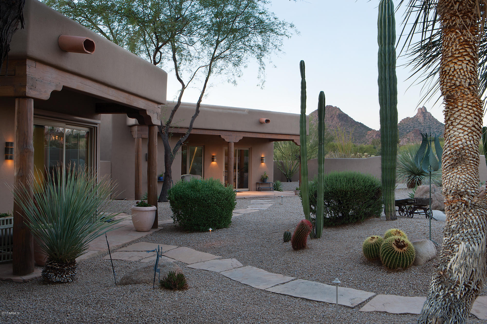 9701 East Happy Valley Road, Unit 13 Scottsdale, AZ 85255 - Photo 20 of 34 Pathway to Guest House Patio