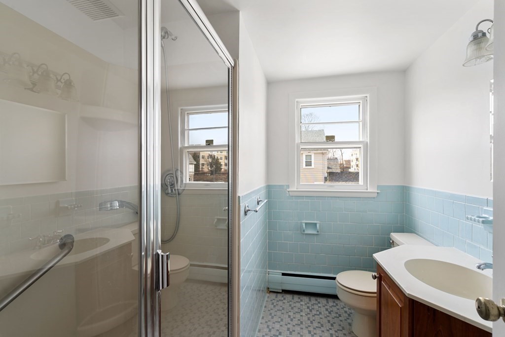 21 Desoto Road Boston, MA 02132 - Photo 19 of 37 a bathroom with a sink toilet and shower
