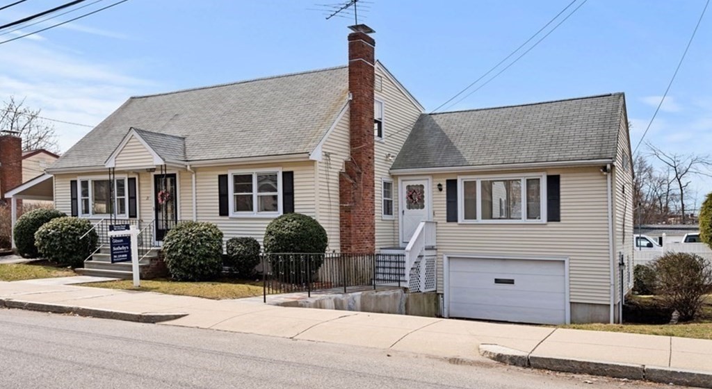 21 Desoto Road Boston, MA 02132 - Photo 2 of 37 a front view of a house with a garden