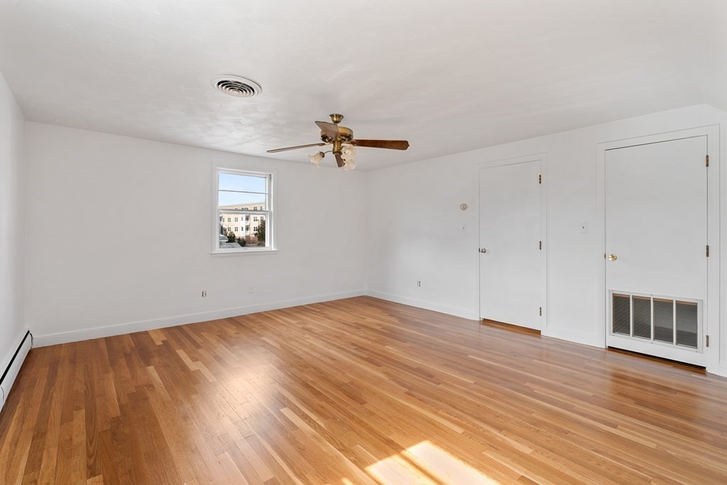 21 Desoto Road Boston, MA 02132 - Photo 28 of 37 wooden floor in an empty room