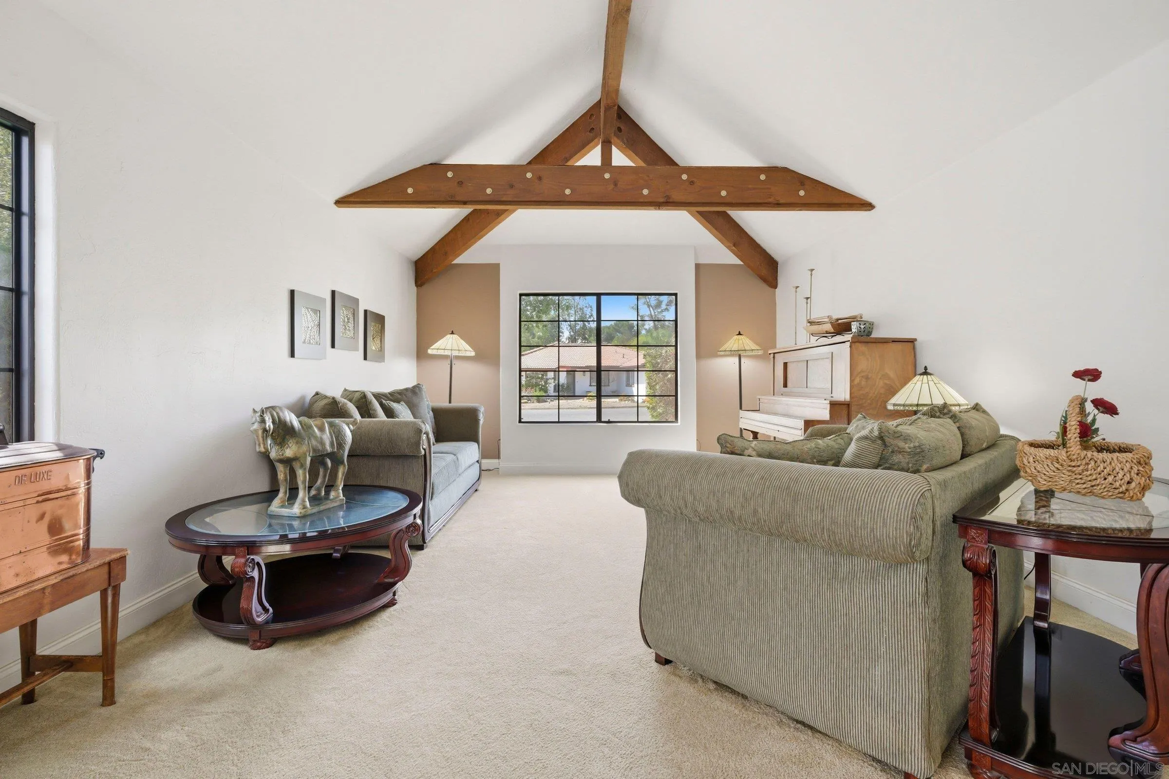 15927 Litten Way Ramona, CA 92065 - Photo 11 of 33 a living room with furniture and a large window