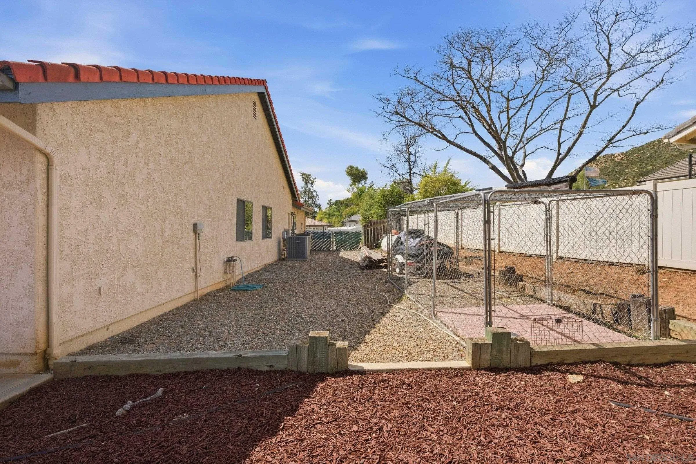 15927 Litten Way Ramona, CA 92065 - Photo 27 of 33 a view of a house with a porch