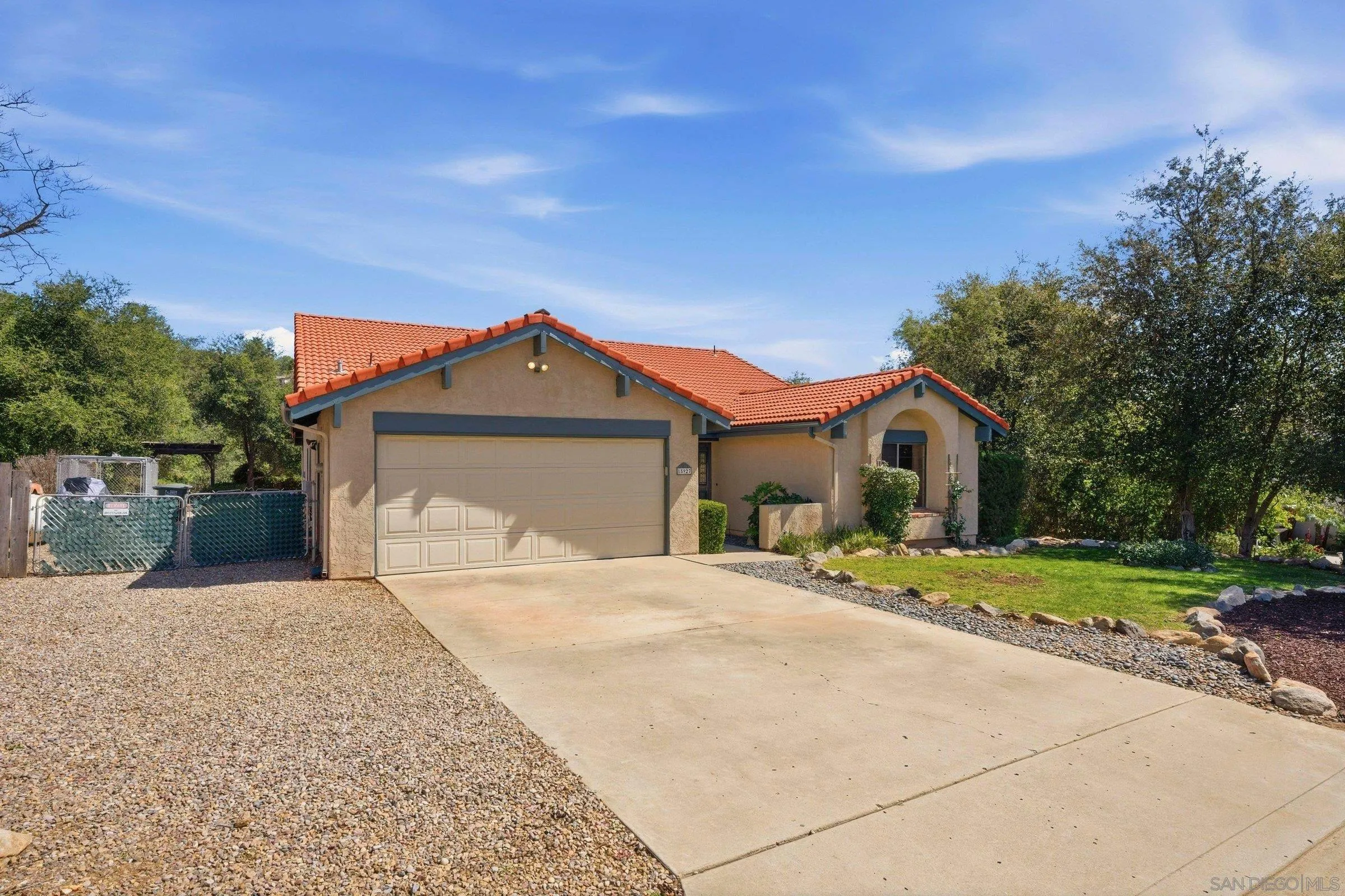 15927 Litten Way Ramona, CA 92065 - Photo 33 of 33 a front view of a house with a yard and garage