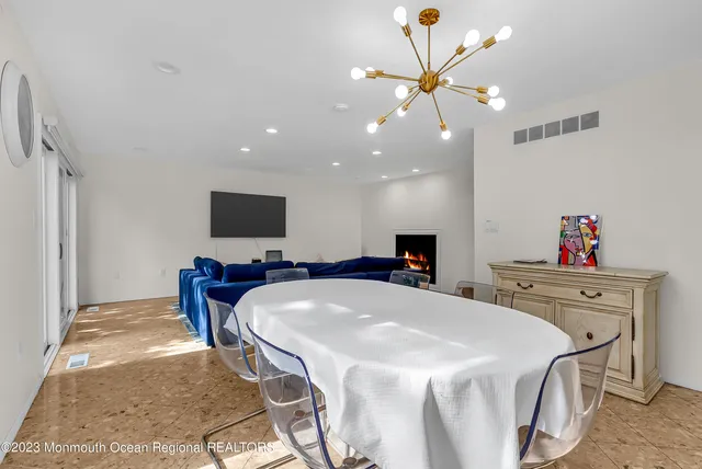 a bed room with a bed and a television