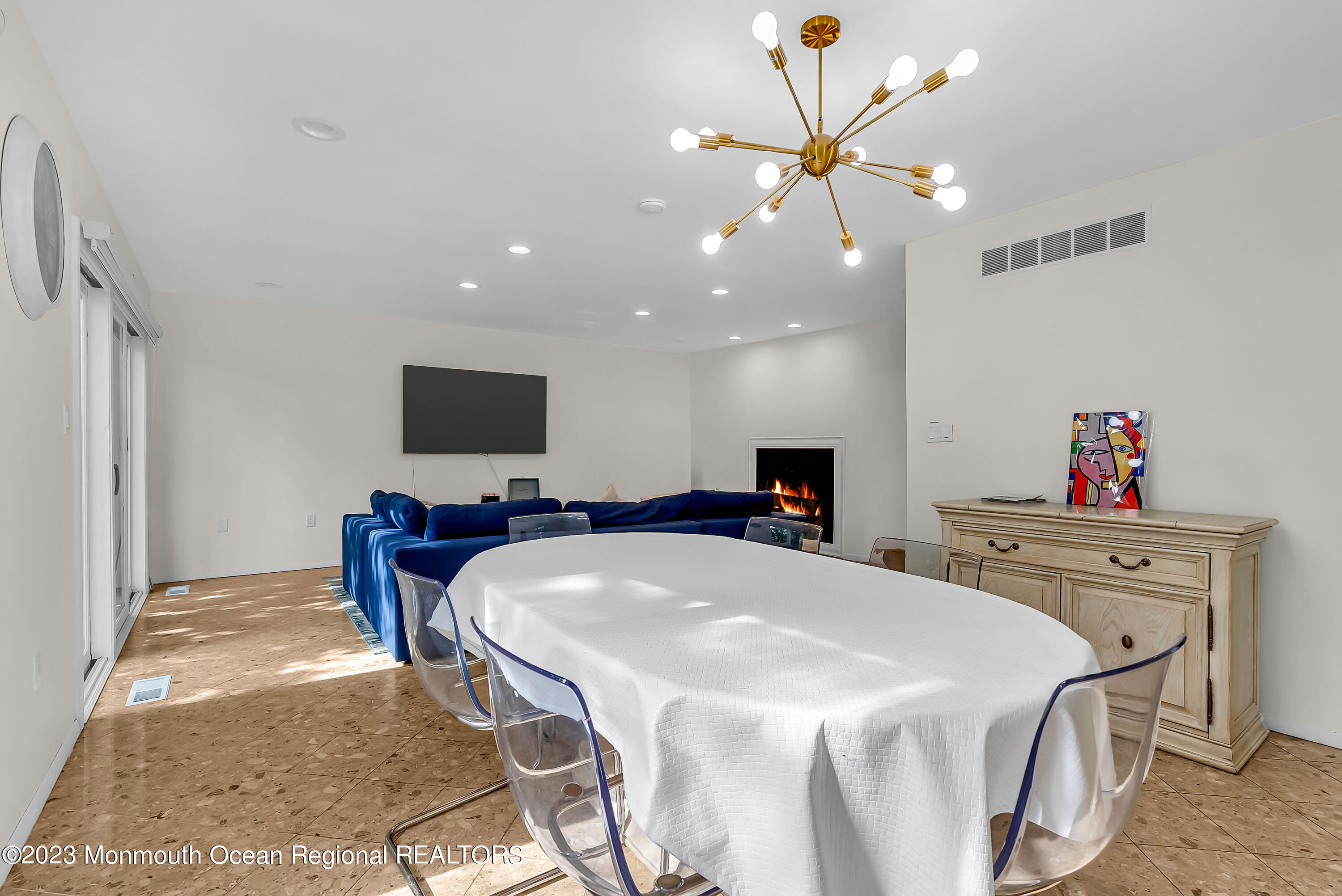 700 Ocean Avenue, Unit 9 Long Branch, NJ 07740 - Photo 14 of 35 a bed room with a bed and a television