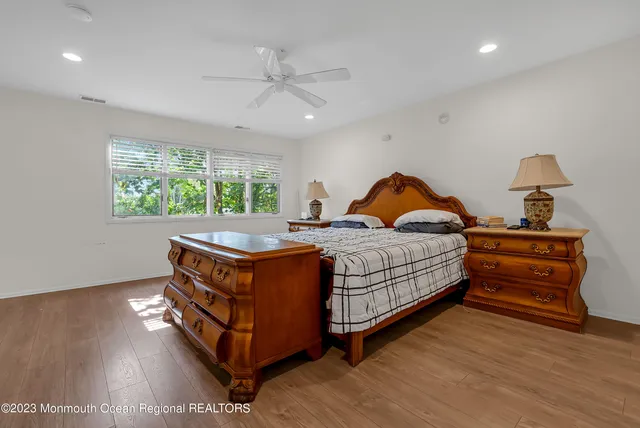 a bed room with a bed and window