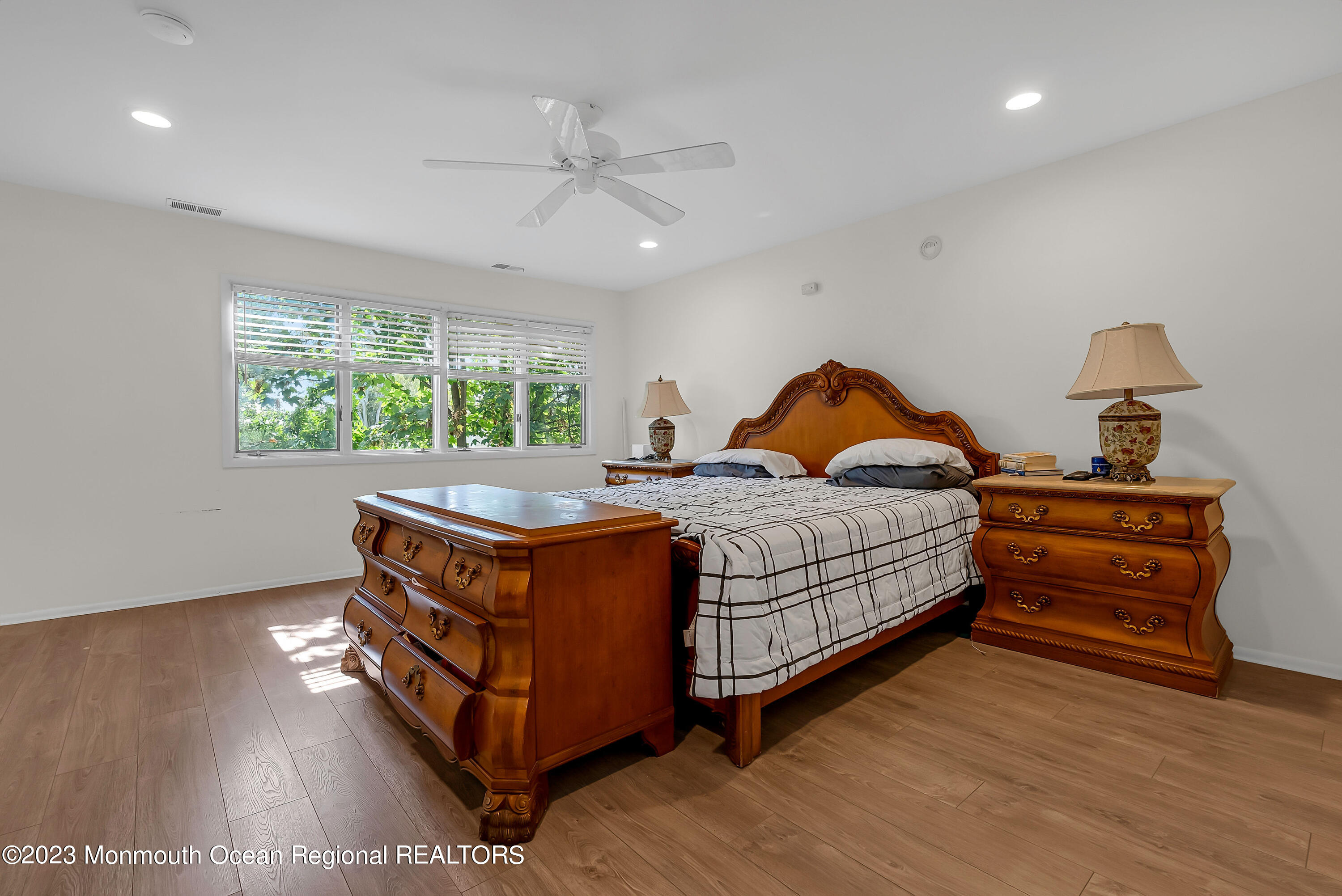 700 Ocean Avenue, Unit 9 Long Branch, NJ 07740 - Photo 18 of 35 a bed room with a bed and window