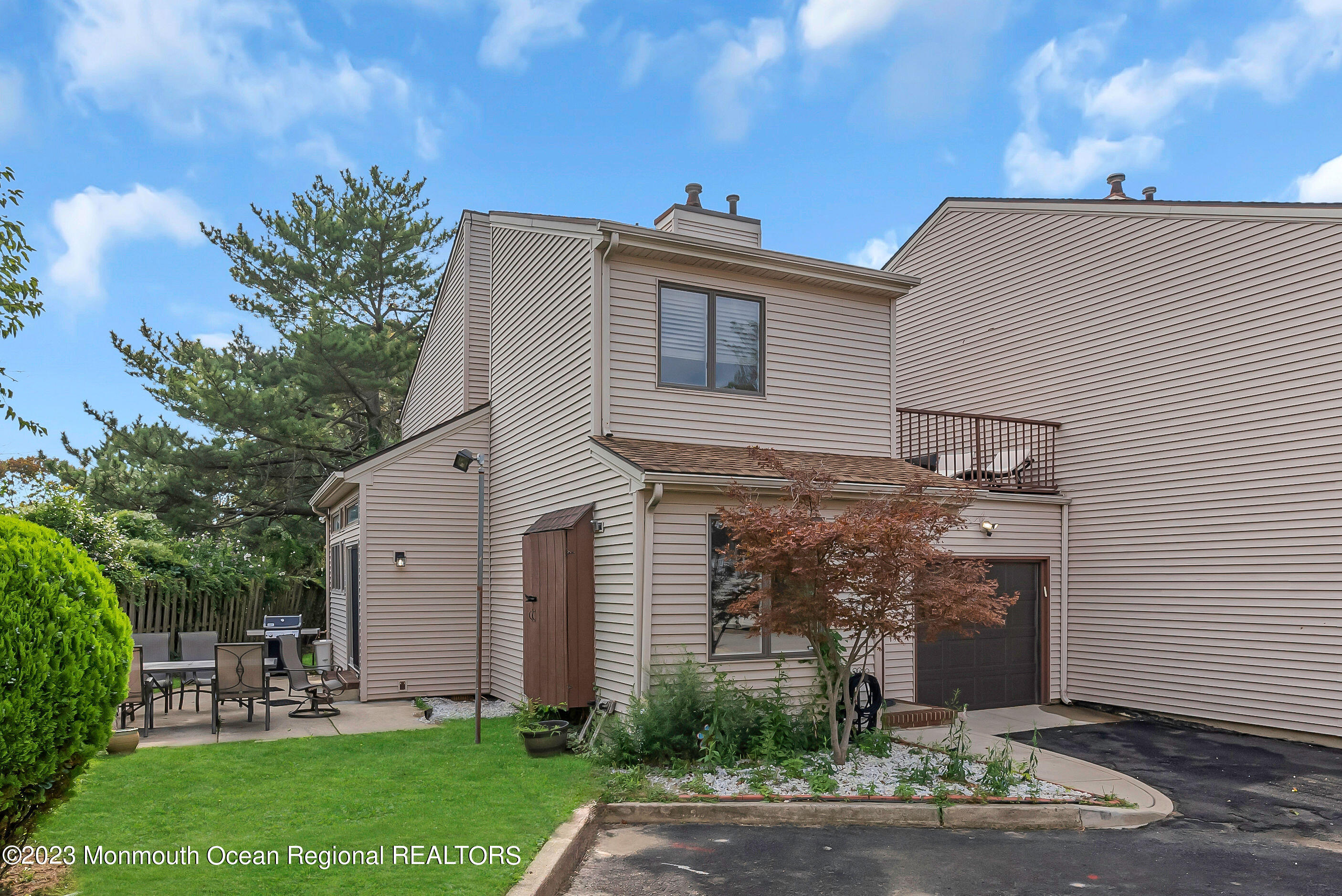 700 Ocean Avenue, Unit 9 Long Branch, NJ 07740 - Photo 2 of 35 a front view of a house with garden