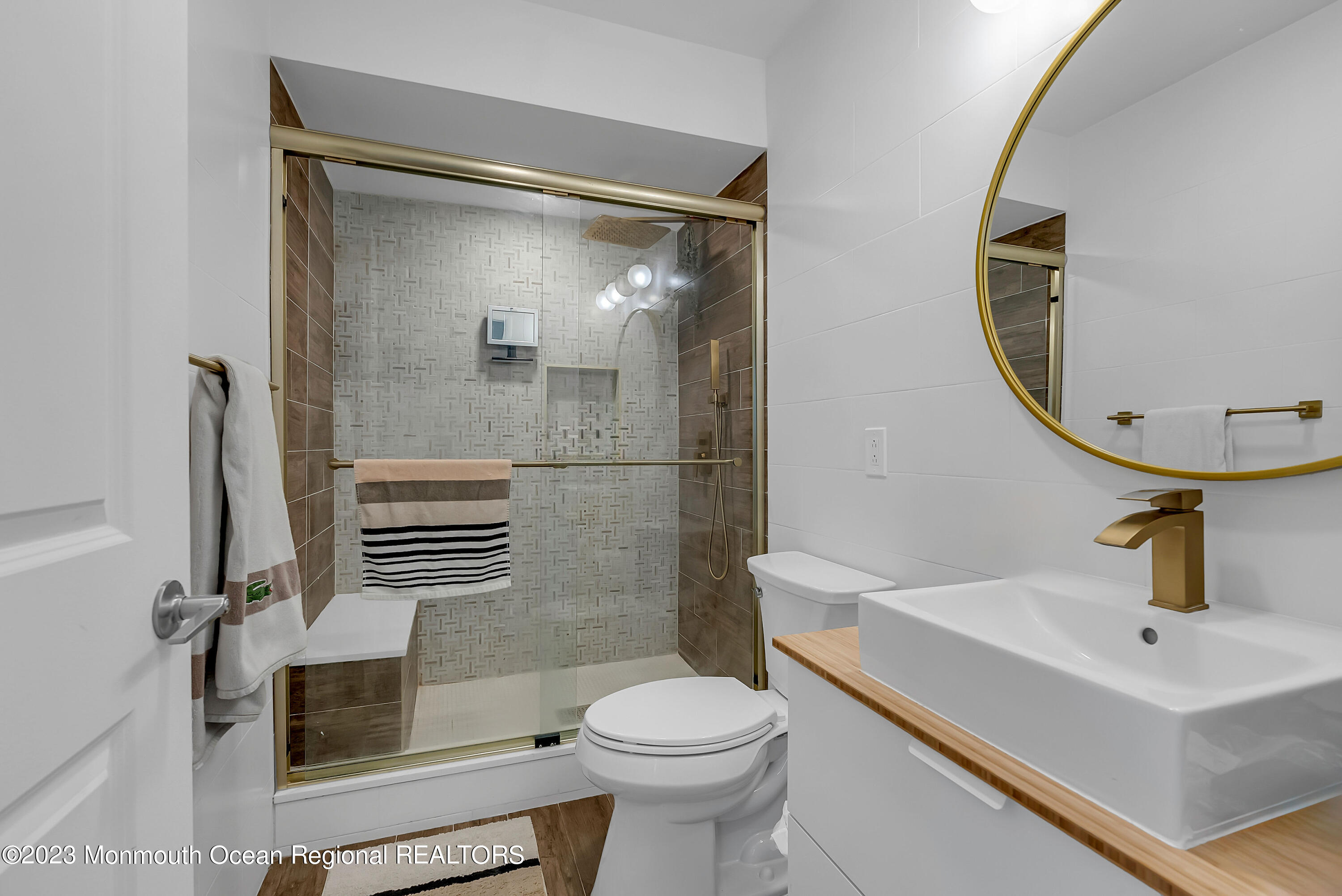 700 Ocean Avenue, Unit 9 Long Branch, NJ 07740 - Photo 23 of 35 a bathroom with a sink toilet and shower