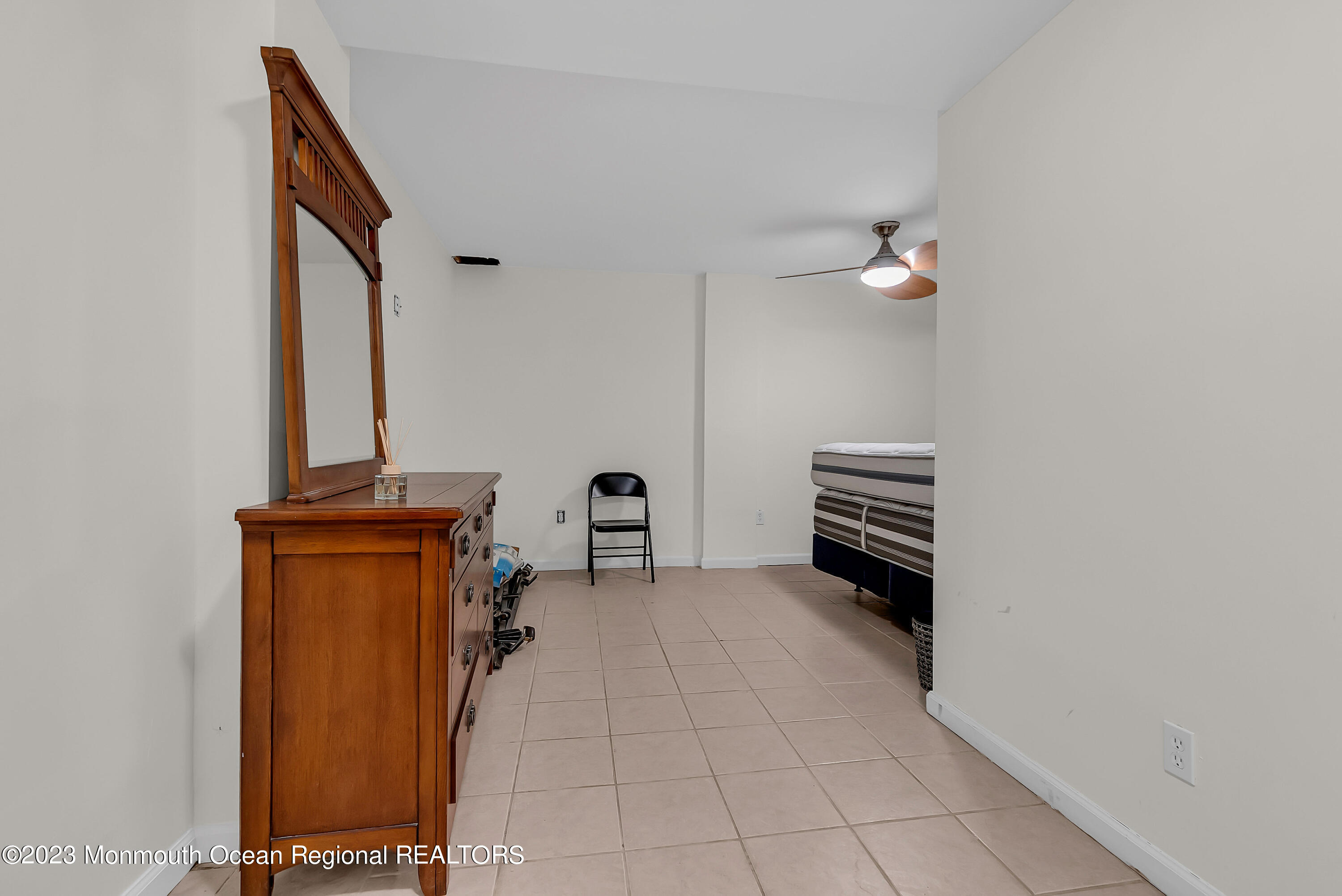 700 Ocean Avenue, Unit 9 Long Branch, NJ 07740 - Photo 26 of 35 a view of an empty room with windows