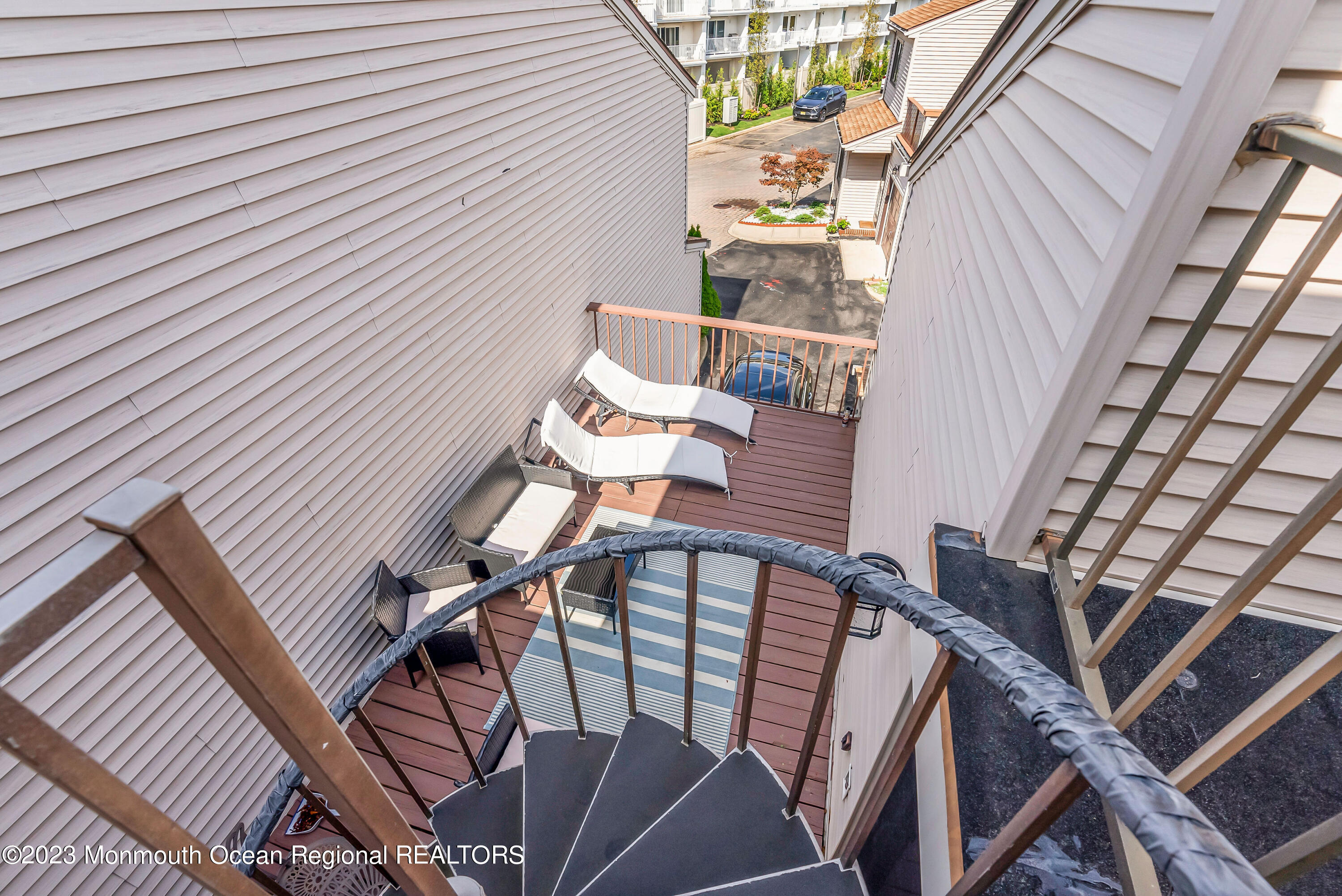700 Ocean Avenue, Unit 9 Long Branch, NJ 07740 - Photo 32 of 35 a view of a balcony with chairs