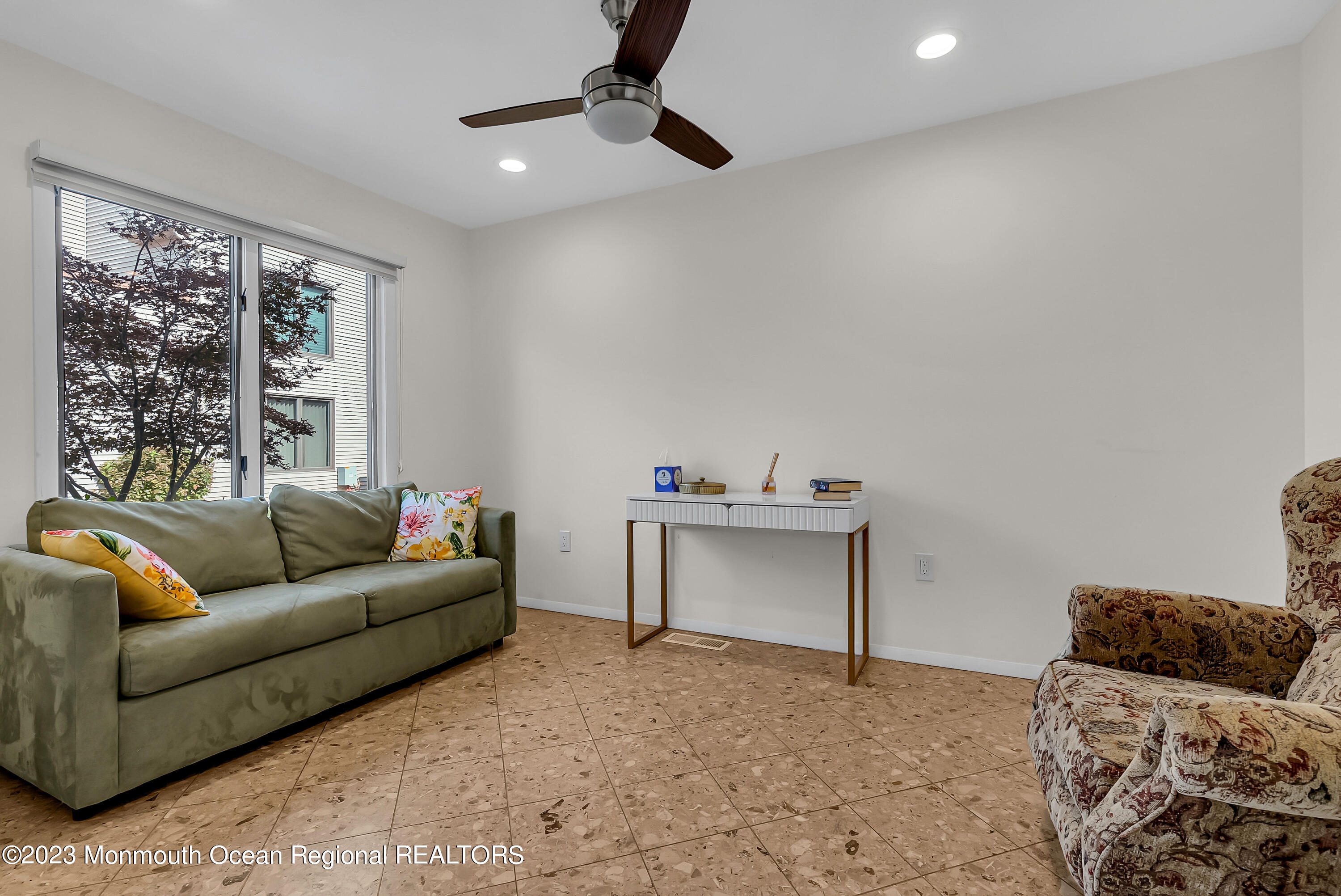 700 Ocean Avenue, Unit 9 Long Branch, NJ 07740 - Photo 4 of 35 a living room with furniture and a window