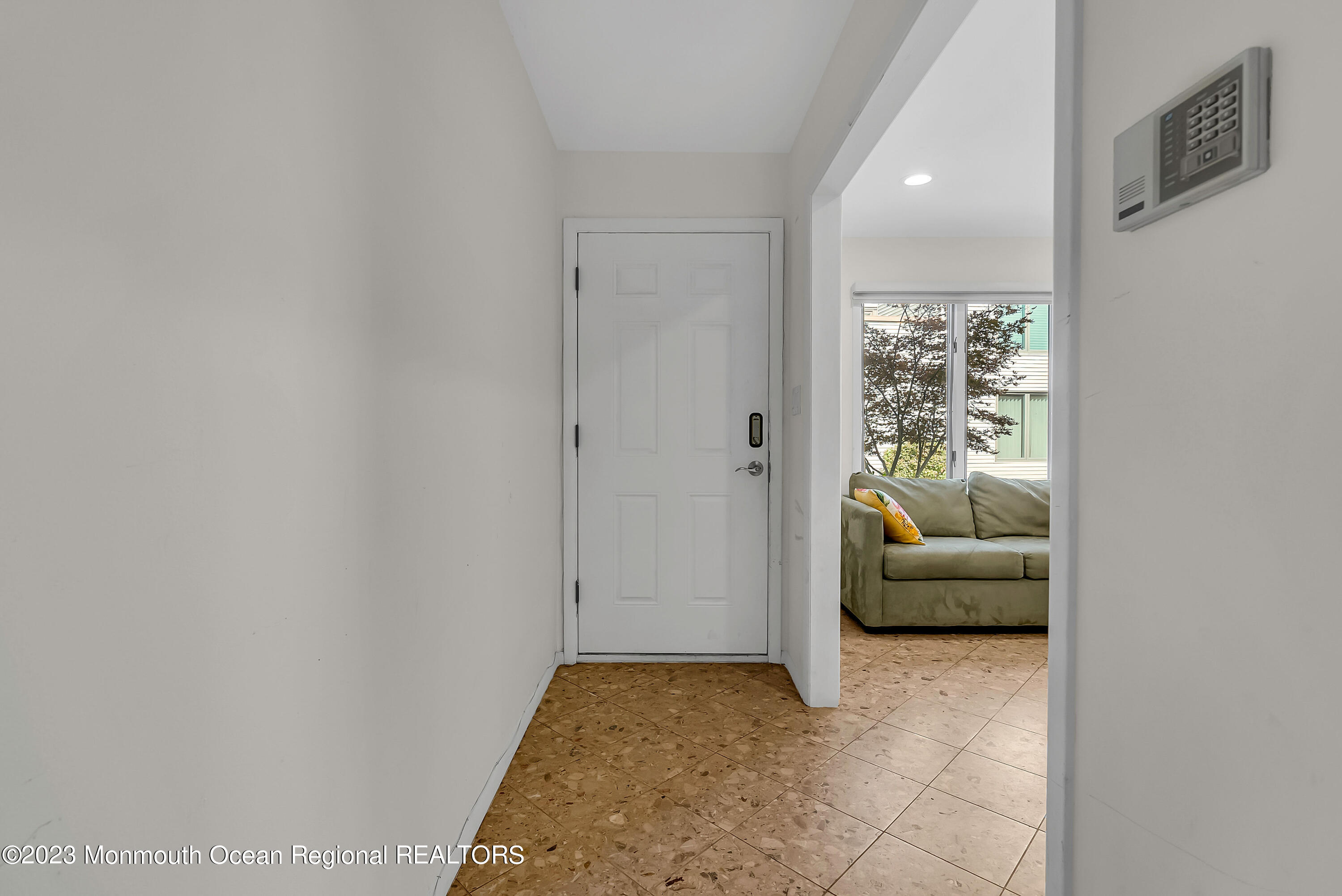 700 Ocean Avenue, Unit 9 Long Branch, NJ 07740 - Photo 6 of 35 a view of hallway with livingroom and furniture