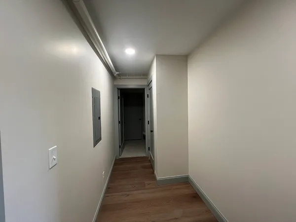 a view of hallway with stairs