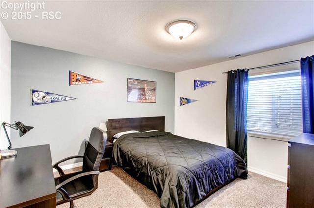 1085 Bowstring Road Monument, CO 80132 - Photo 20 of 28 Lower Level Bedroom