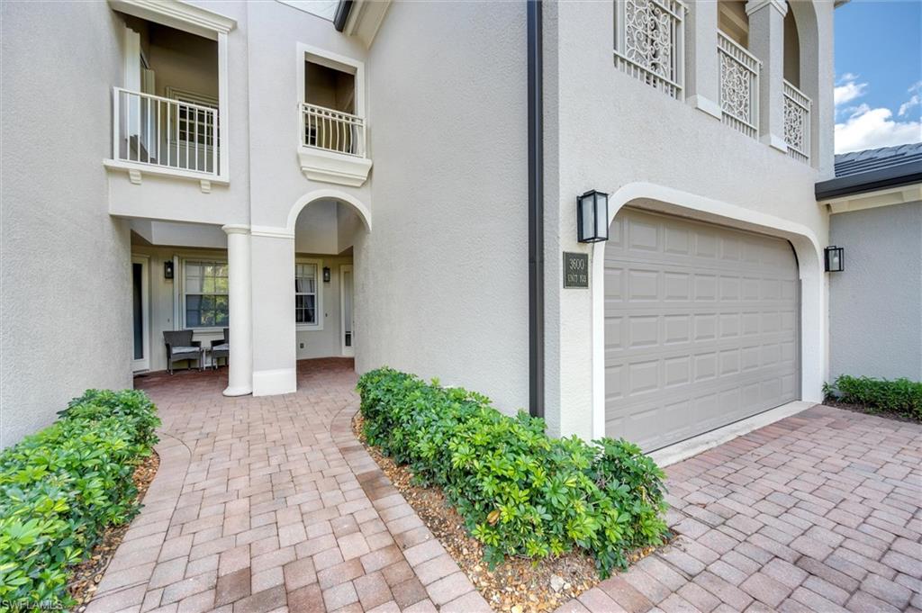 3600 Lansing Loop, Unit 103 Estero, FL 33928 - Photo 9 of 33 a view of a pathway along the building