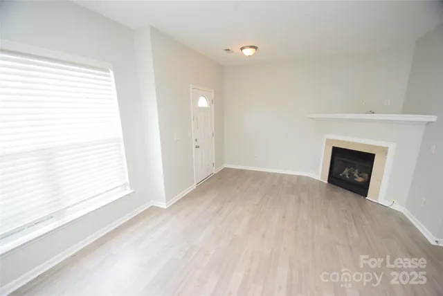 a view of empty room with front door