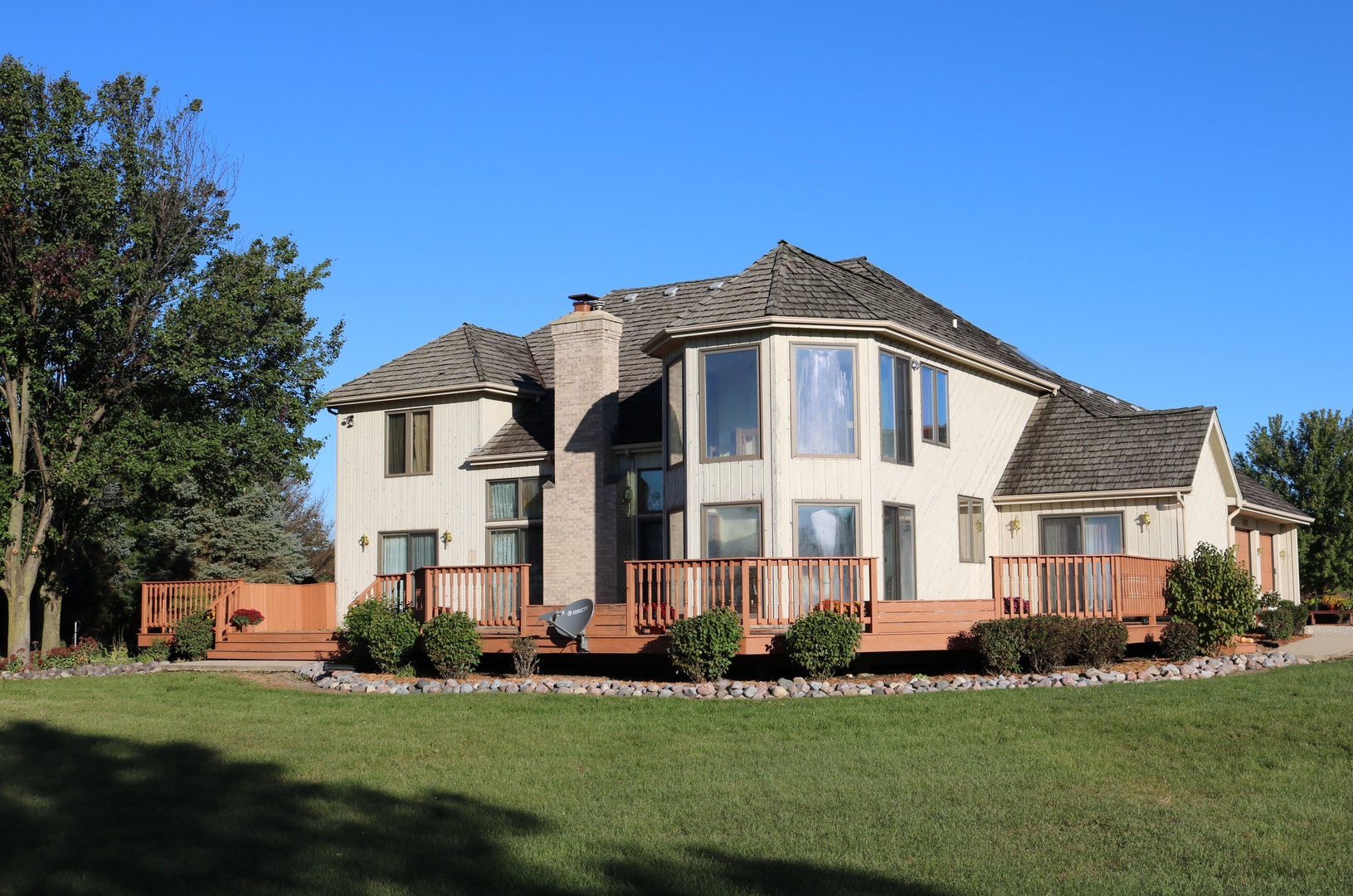 12232 Grove Road Minooka, IL 60447 - Photo 1 of 57 a front view of a house with a garden
