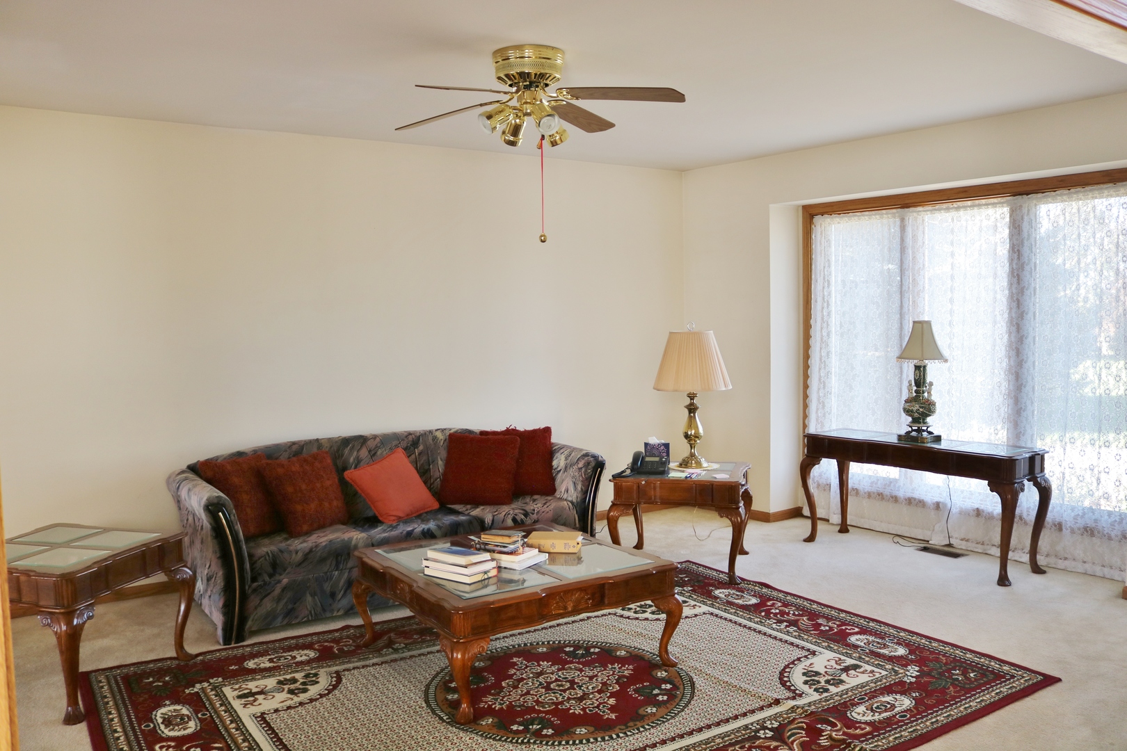 12232 Grove Road Minooka, IL 60447 - Photo 23 of 57 a living room with furniture a rug and a large window