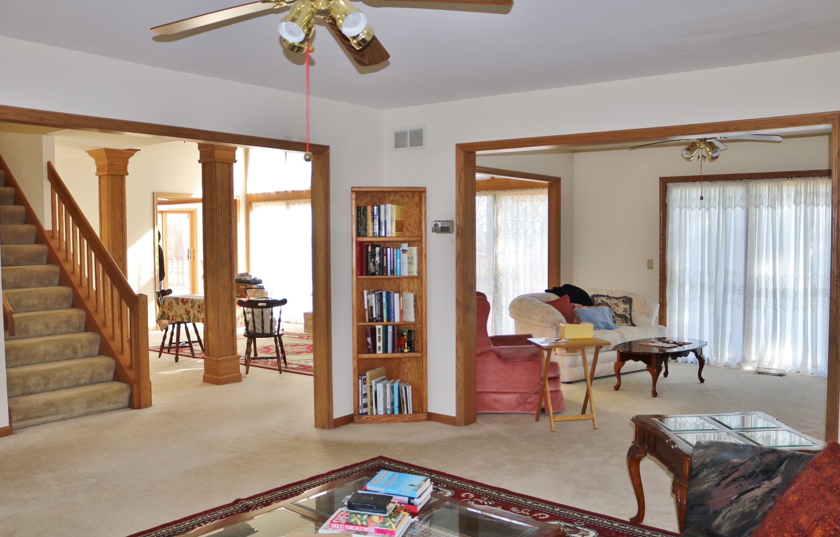 12232 Grove Road Minooka, IL 60447 - Photo 25 of 57 a living room with furniture and large windows