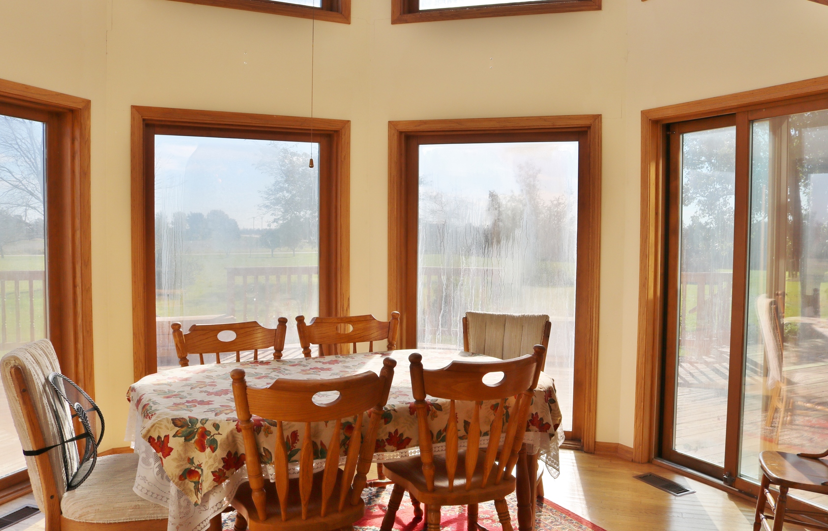 12232 Grove Road Minooka, IL 60447 - Photo 31 of 57 a dining room with furniture and large windows