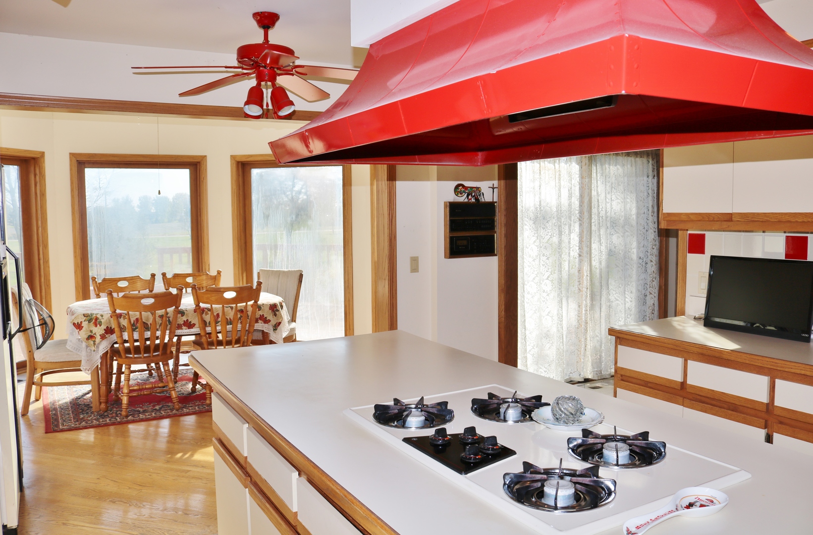 12232 Grove Road Minooka, IL 60447 - Photo 32 of 57 a dining room with furniture and a floor to ceiling window