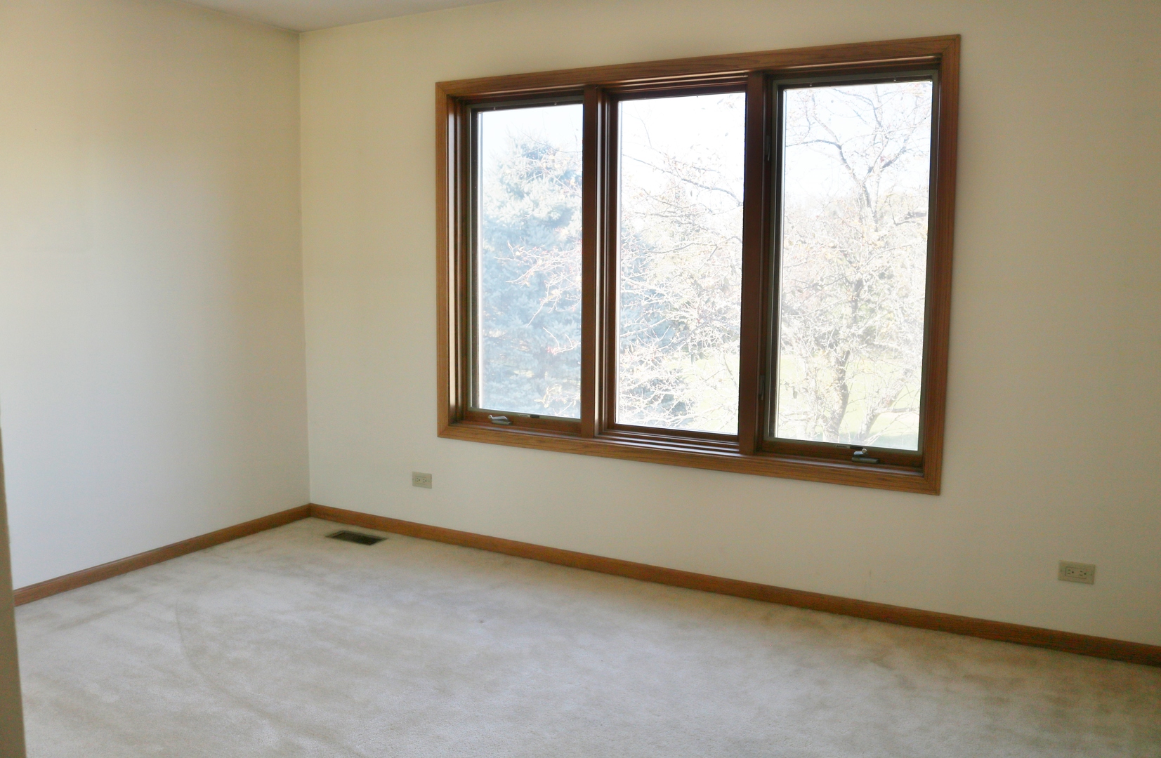 12232 Grove Road Minooka, IL 60447 - Photo 41 of 57 an empty room with a window