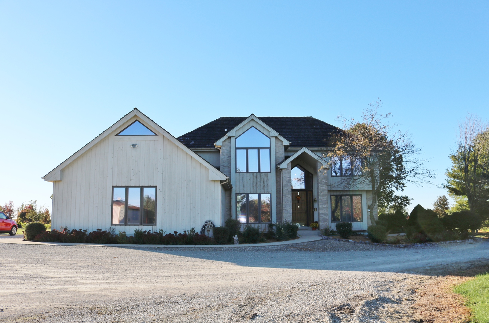 12232 Grove Road Minooka, IL 60447 - Photo 48 of 57 a front view of a house with a yard