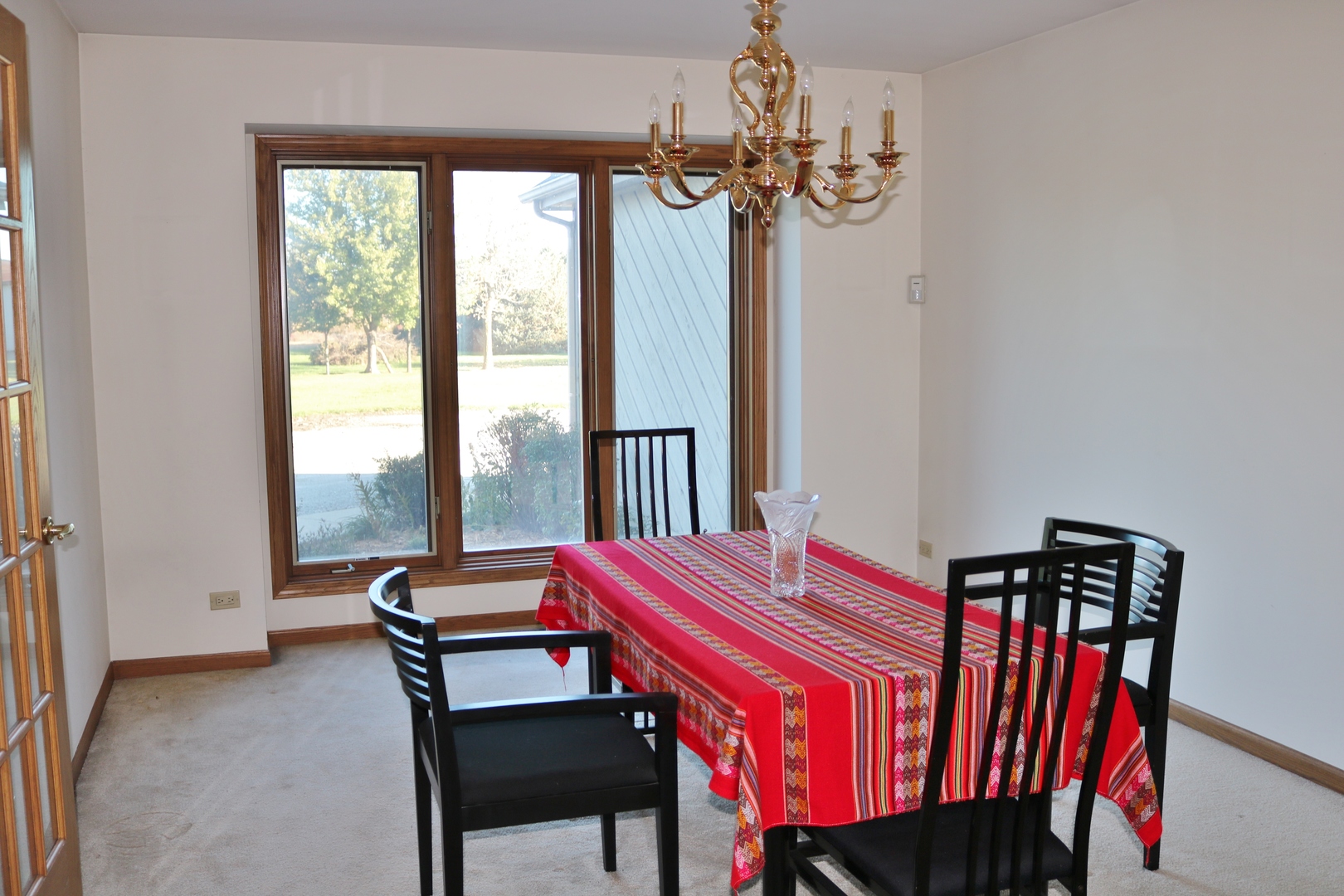 12232 Grove Road Minooka, IL 60447 - Photo 49 of 57 a view of a dining room with furniture window and outside view